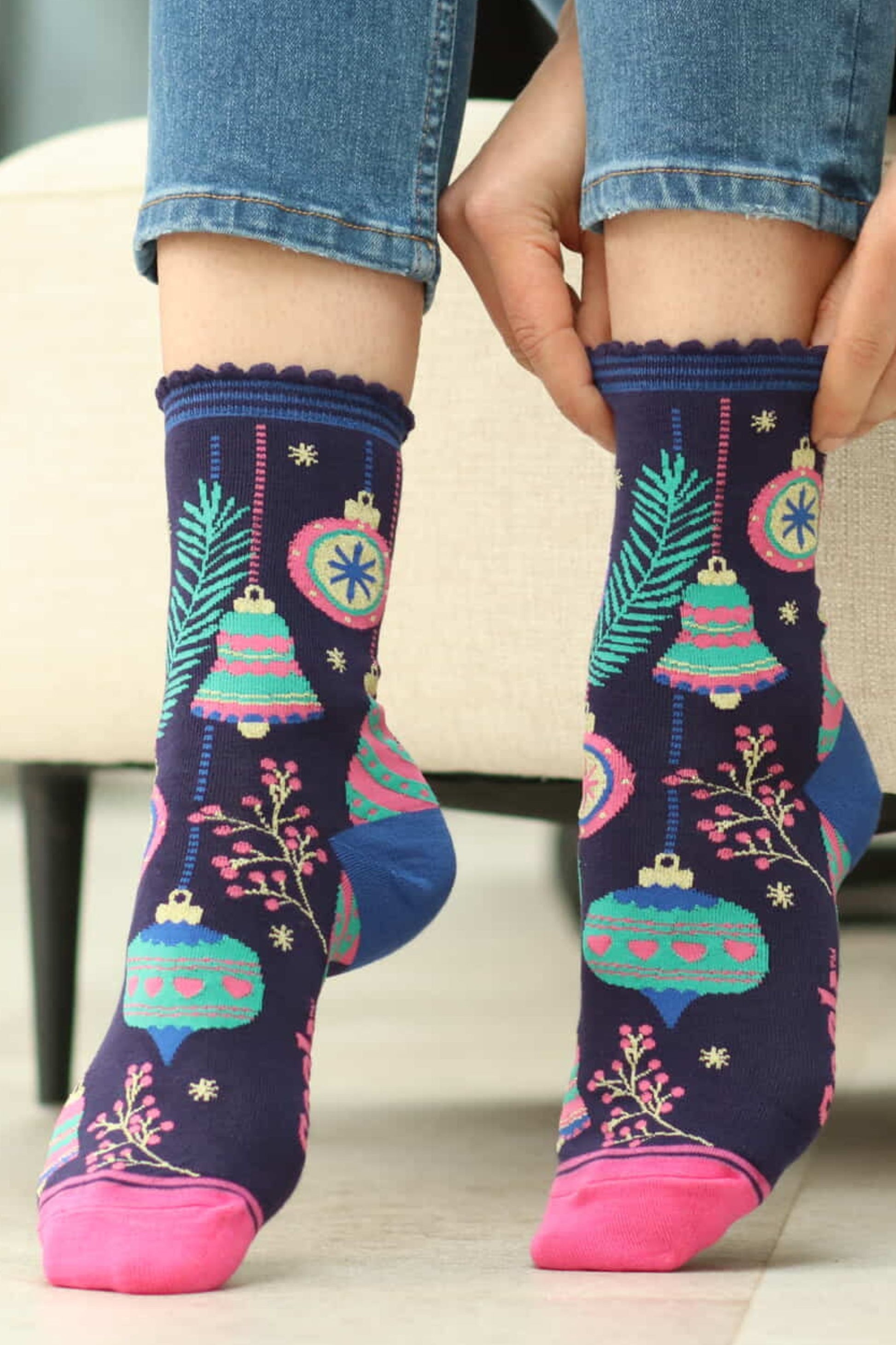 christmas bauble socks worn by a model