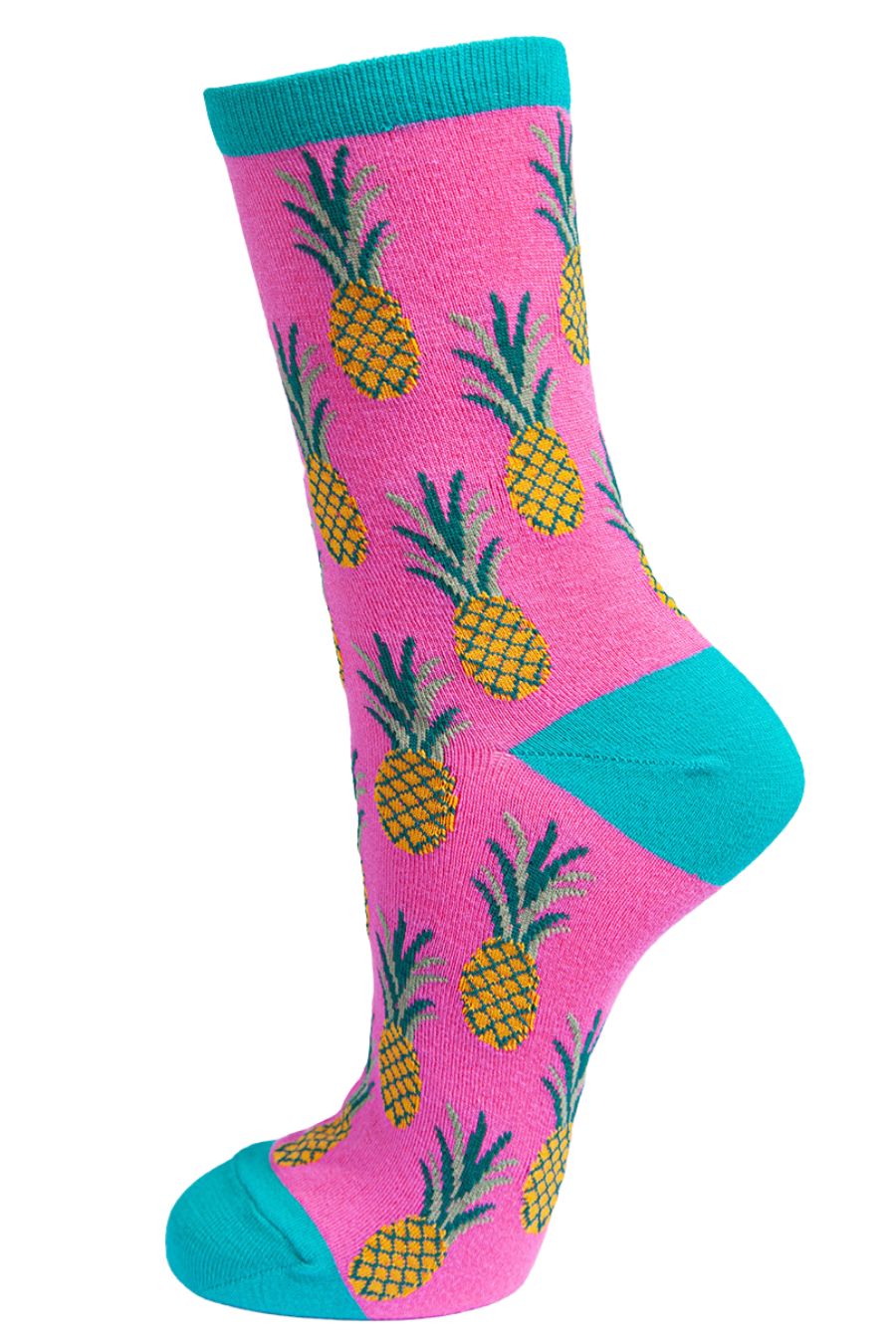 pink ankle socks, blue toe, heel and trim with all over yellow pineapple print