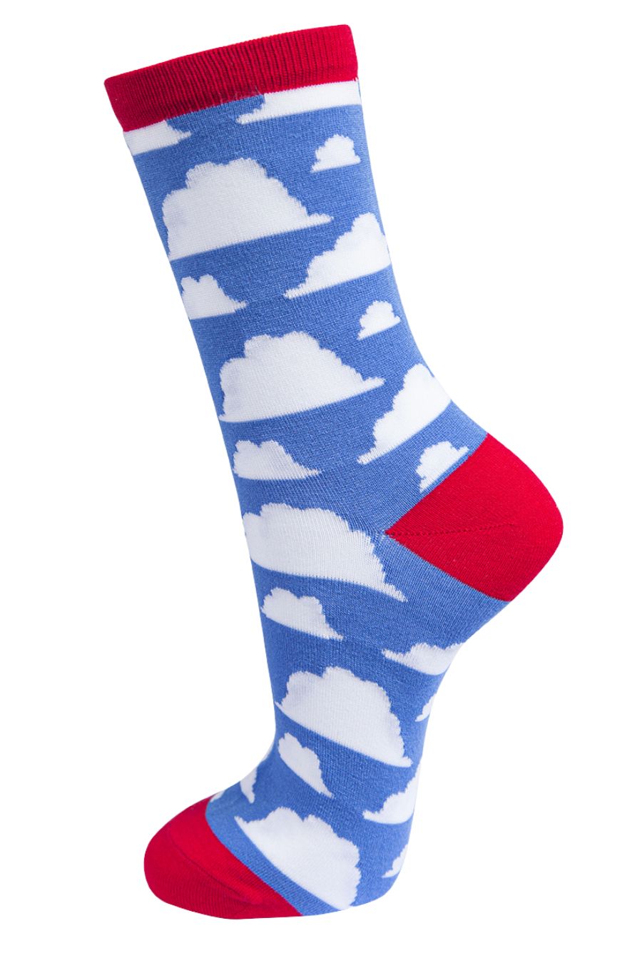 blue ankle socks, with red toe, heel and trim with an all over white cloud pattern