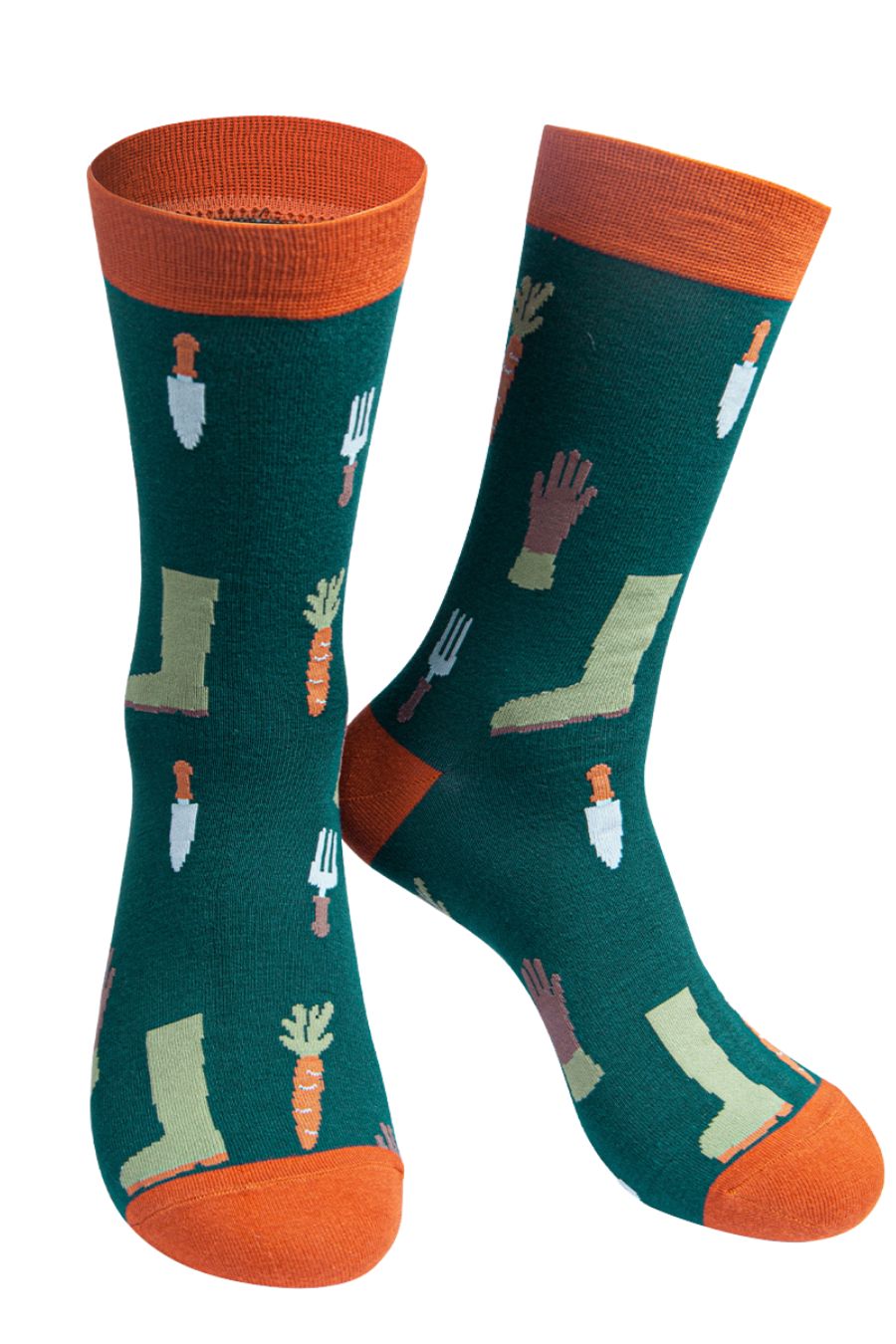green dress socks with a pattern of garden tools, garden gloves and boots