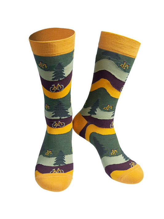 green, brown and yellow socks with a yellow heel, toe and cuff with a patten trees and mountain bikes
