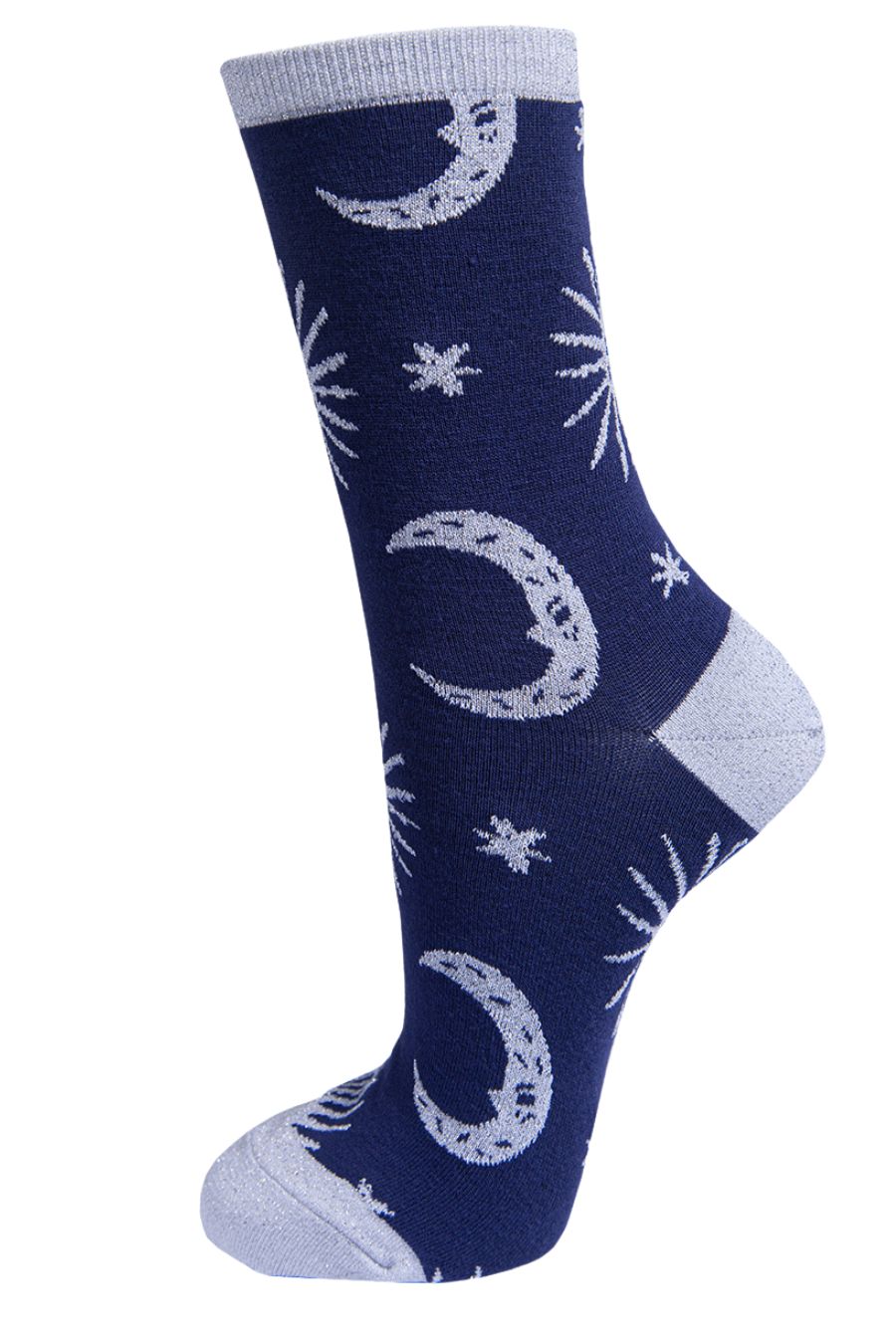 navy blue, silver glitter socks with moons and stars on them
