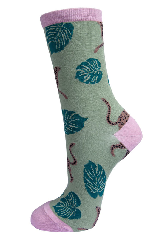 green bamboo socks with green leaves and brown cheetahs