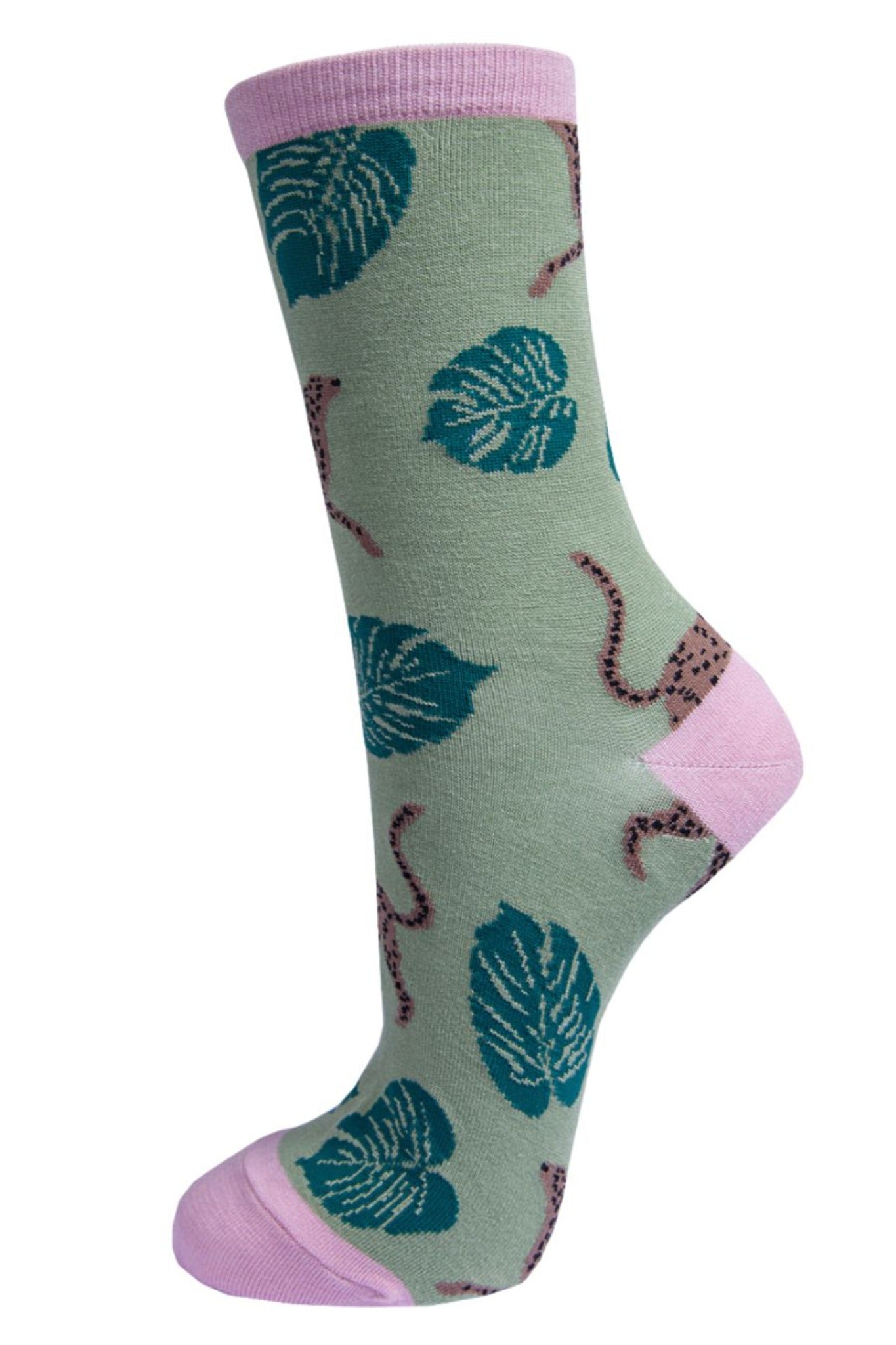 green bamboo socks with an all over leaf print and cheetah cats