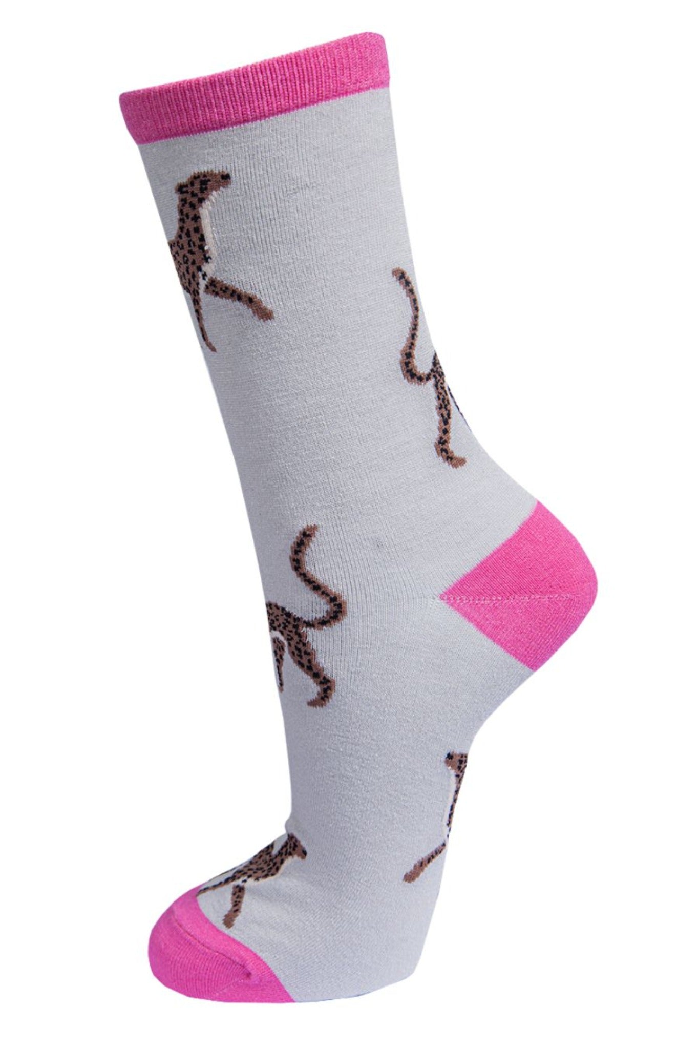 grey bamboo socks with pink heel, cuff and toe with an all over pattern of brown cheetah cats