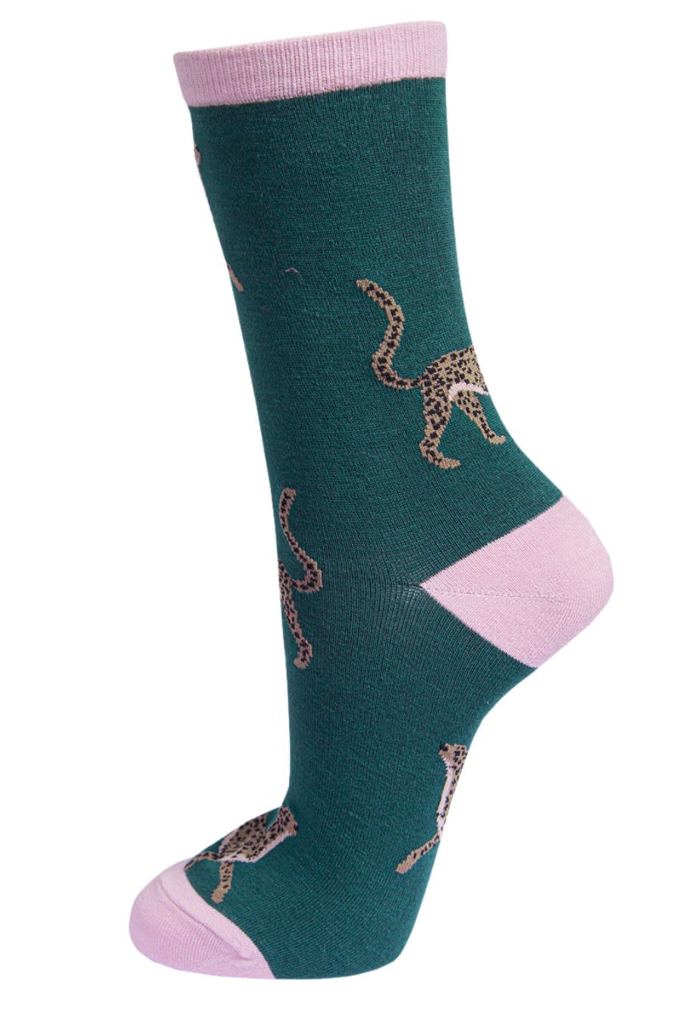 green bamboo socks with pink heel, toe and cuff with an all over pattern of brown cheetah cats