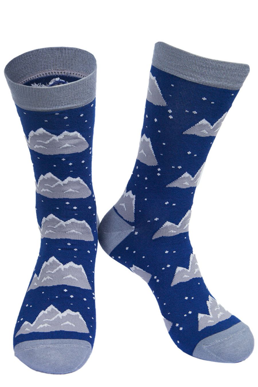 blue and grey bamboo dress socks with a snowy mountain and snowflake pattern design