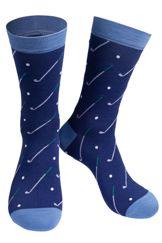 navy blue dress socks with an all over pattern of golf balls and clubs