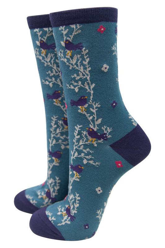 blue ankle socks with blackbirds and a floral print vine pattern