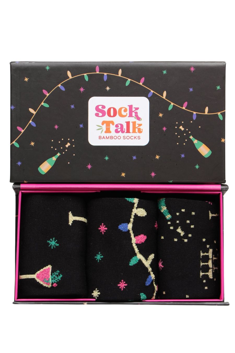 black and multicoloured gift box designed to look like a party with champagne bottiles, lights and stars, with three pairs of ankle socks