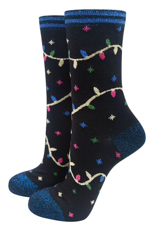 black bamboo socks with blue glitter heel, toe and trim with a multicoloured xmas lights patterns