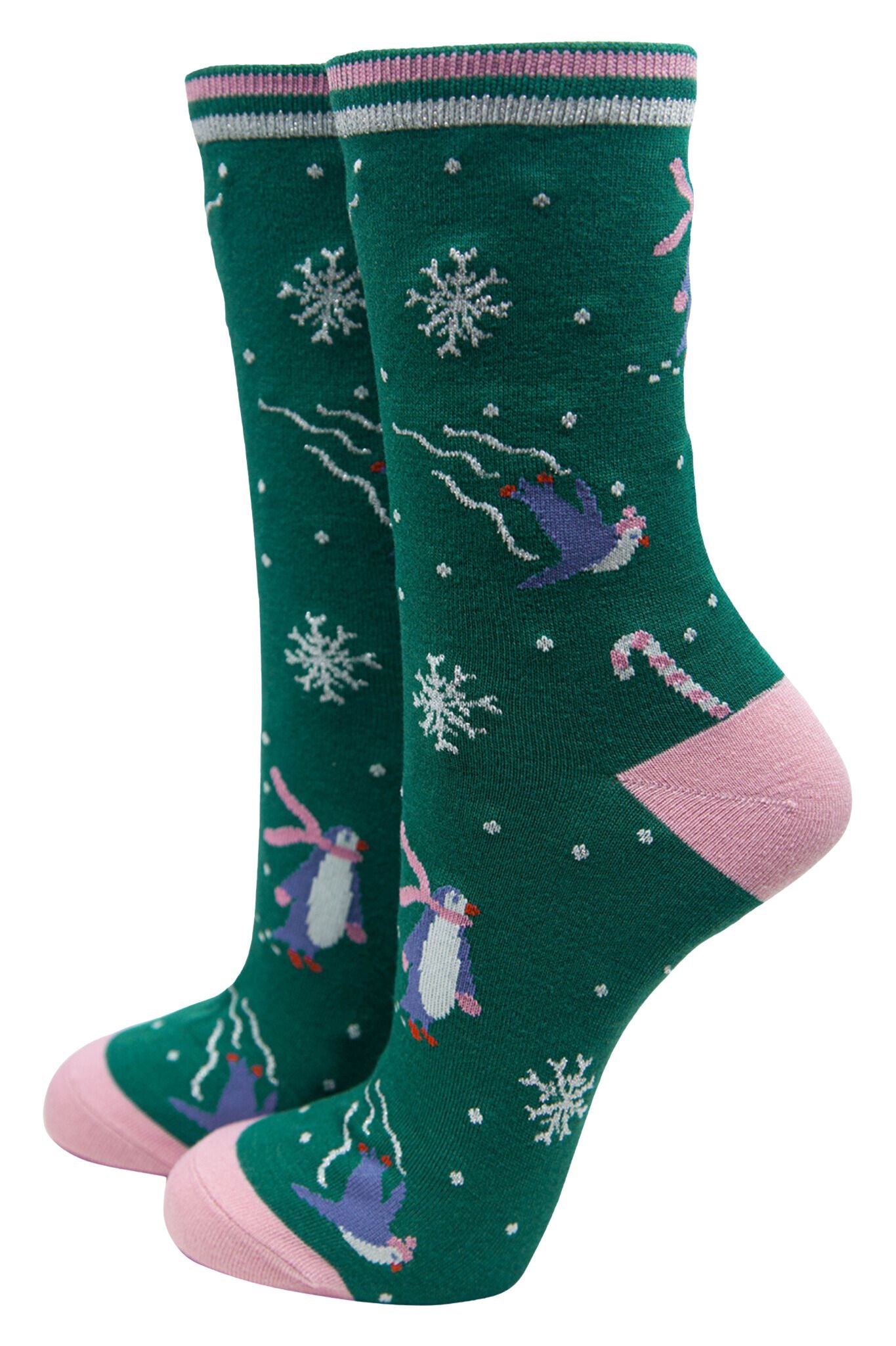 green bamboo socks with skating penguins and silver glitter acceents