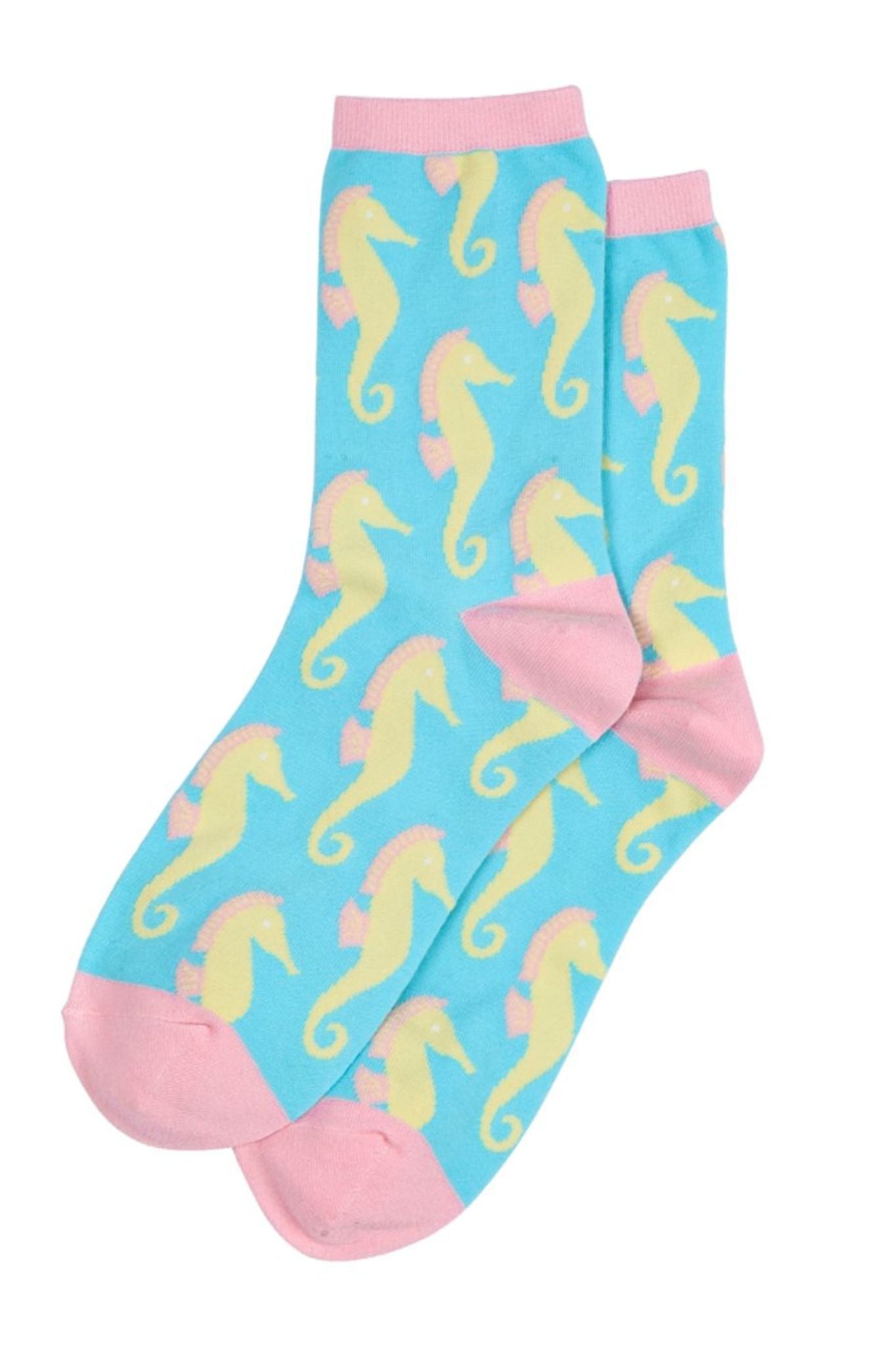 blue socks with an all over seahorse pattern