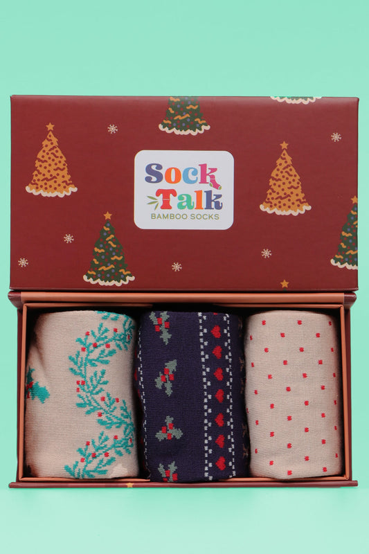 three pairs of christmas robin themed bamboo socks in a red xmas tree pattern gift box