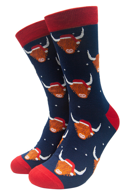 navy blue and red bamboo dress socks featuring highland cows wearing santa hats