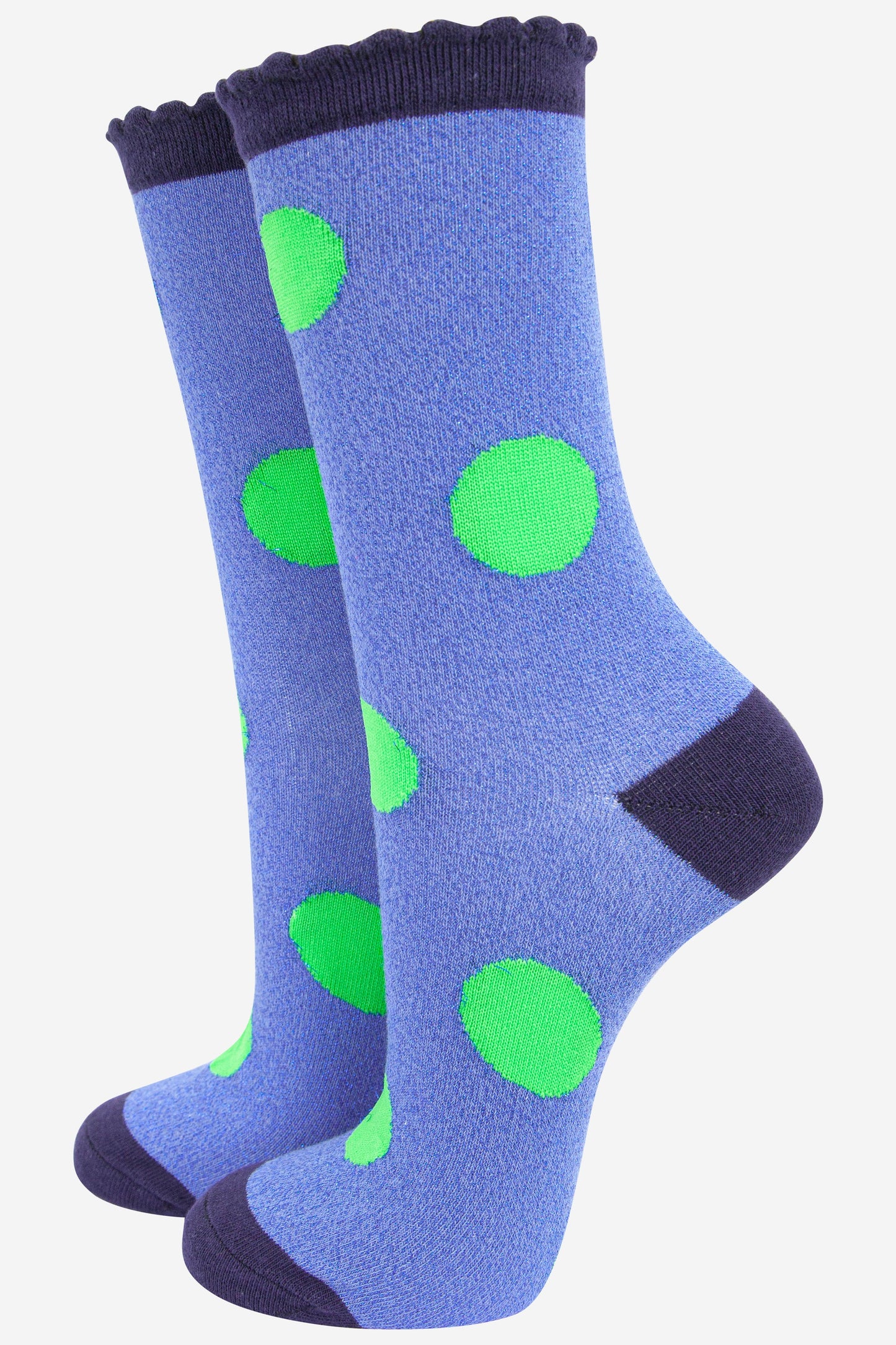 denim blue glitter socks with an all over large polka dot lime green pattern 