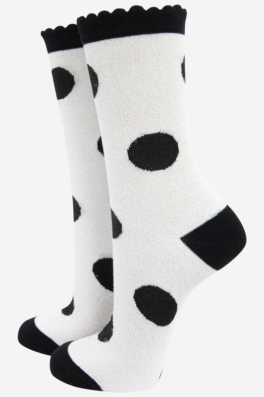 light grey and black polka dot glitter ankle socks with a black scalloped top and an all over glitter sparkle