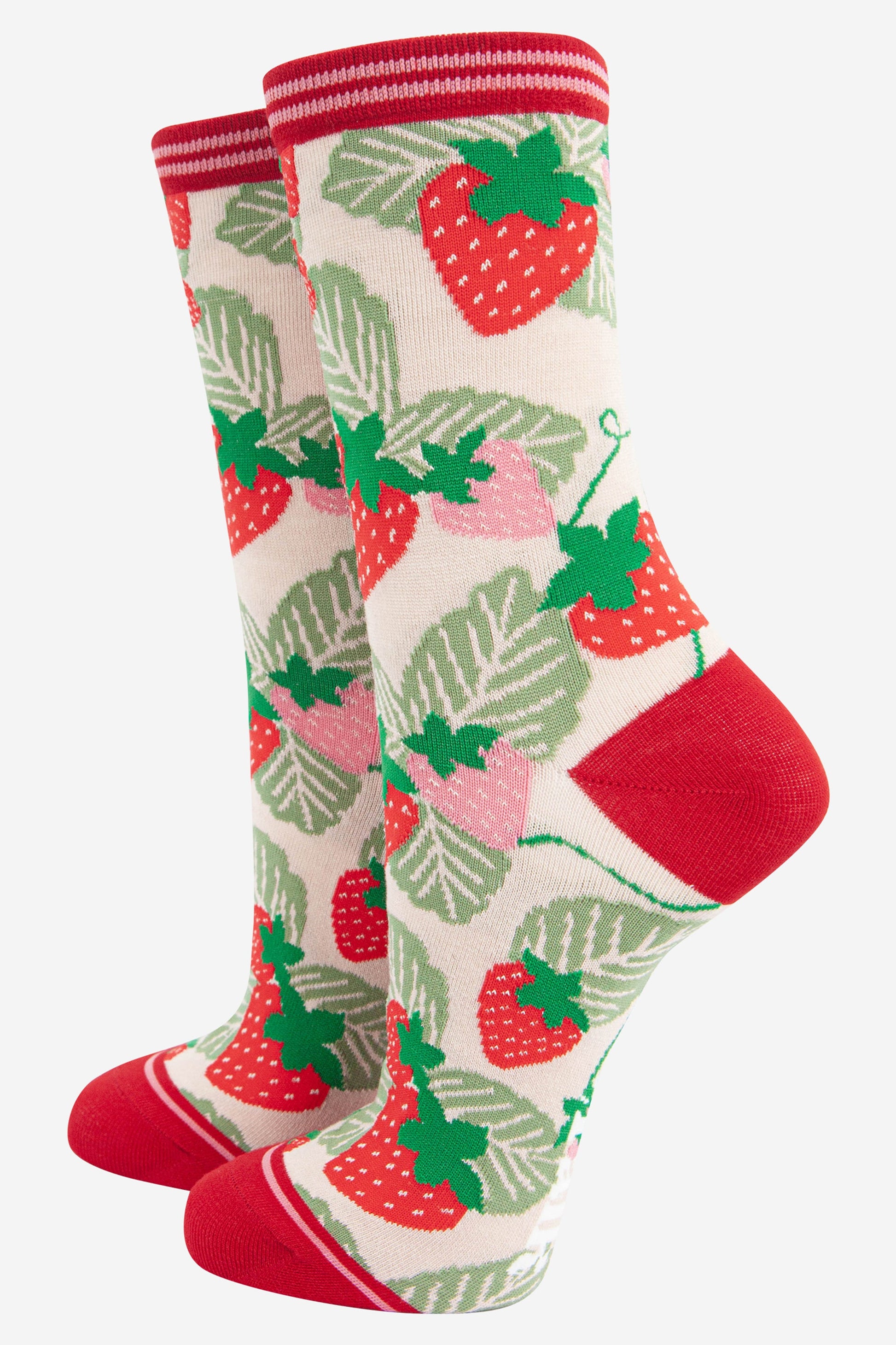 cream and red bamboo ankle socks with an all over pattern of red and green strawberries and leaves