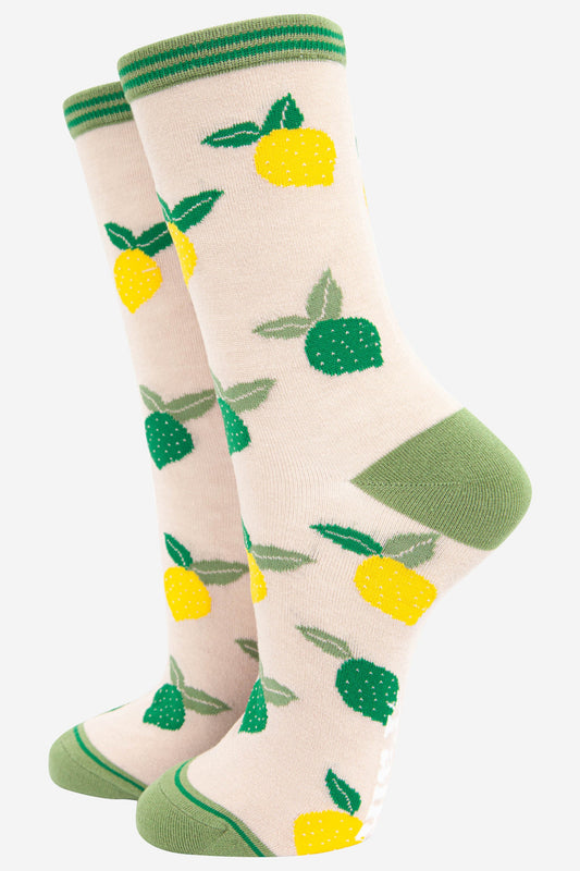 cream bamboo ankle socks with an all over pattern of yellow lemons and green lime fruit