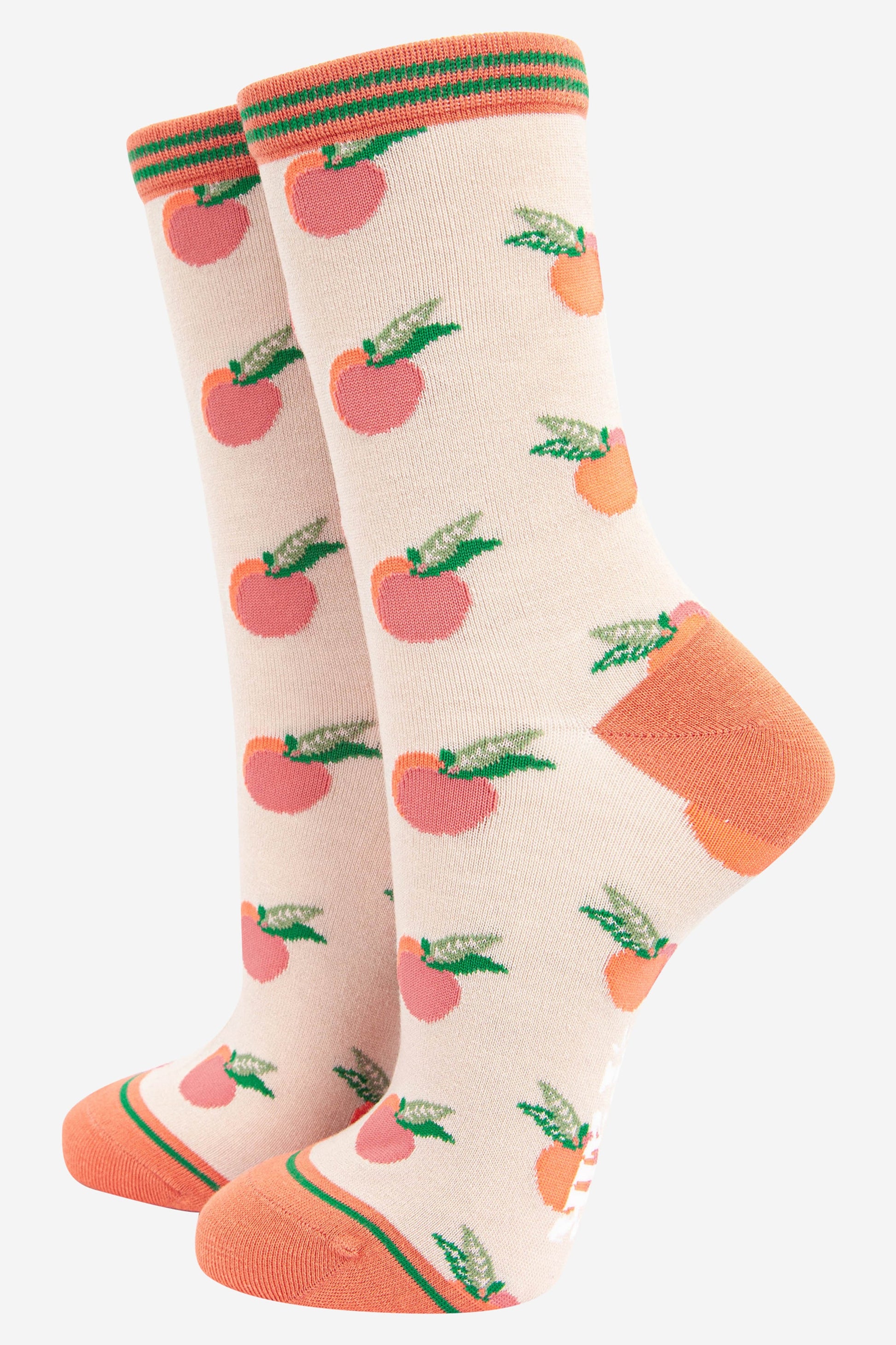 cream bamboo socks with an all over peach fruit pattern with a striped cuff
