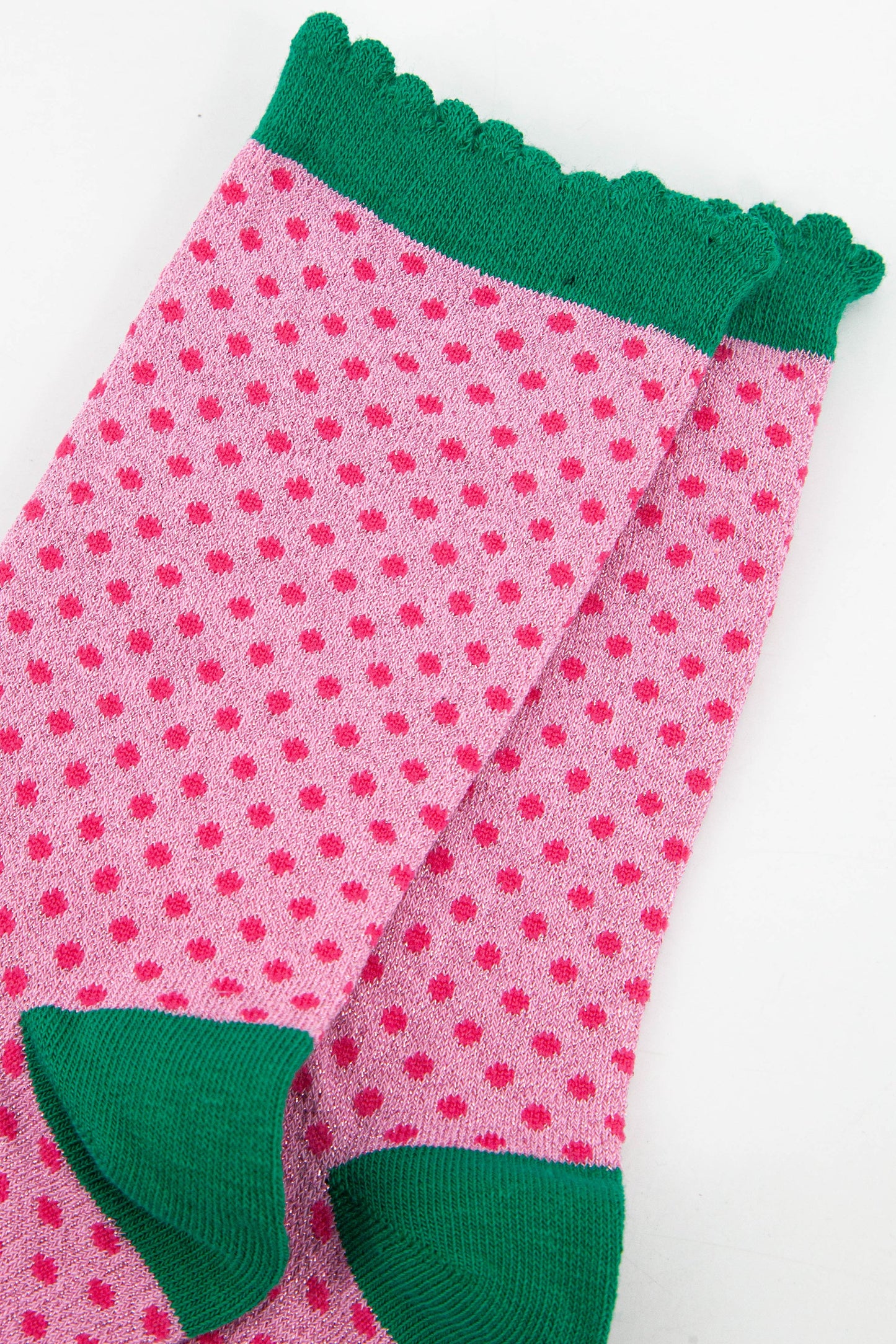 close up of the pink sparkly polka dot material
