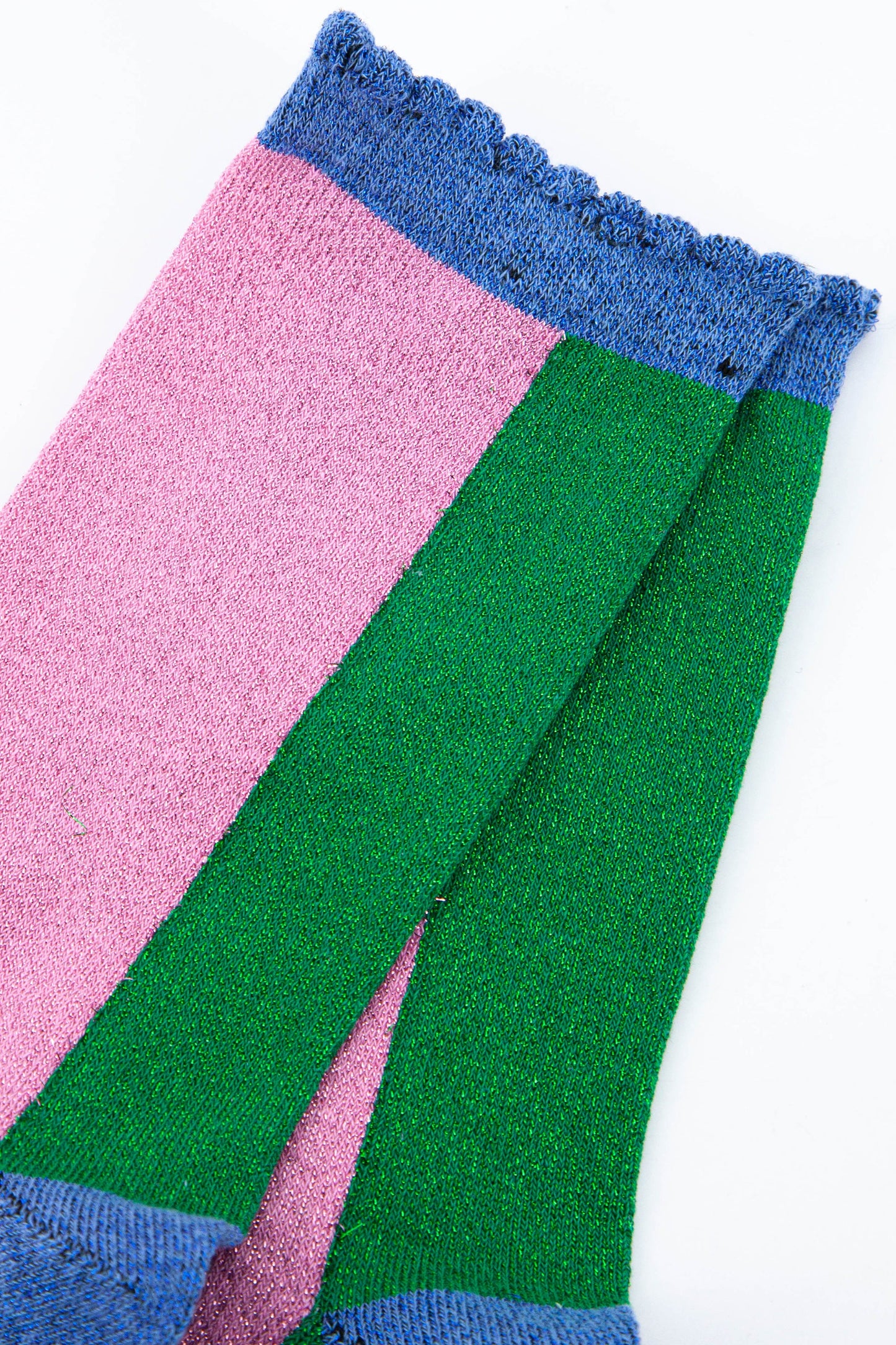 close up of the sparkly pink and green cotton glitter socks