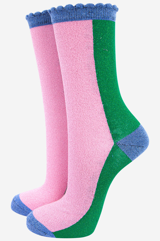 pink and green colour block sparkly glitter socks with blue scalloped edges and an all over shimmer effect