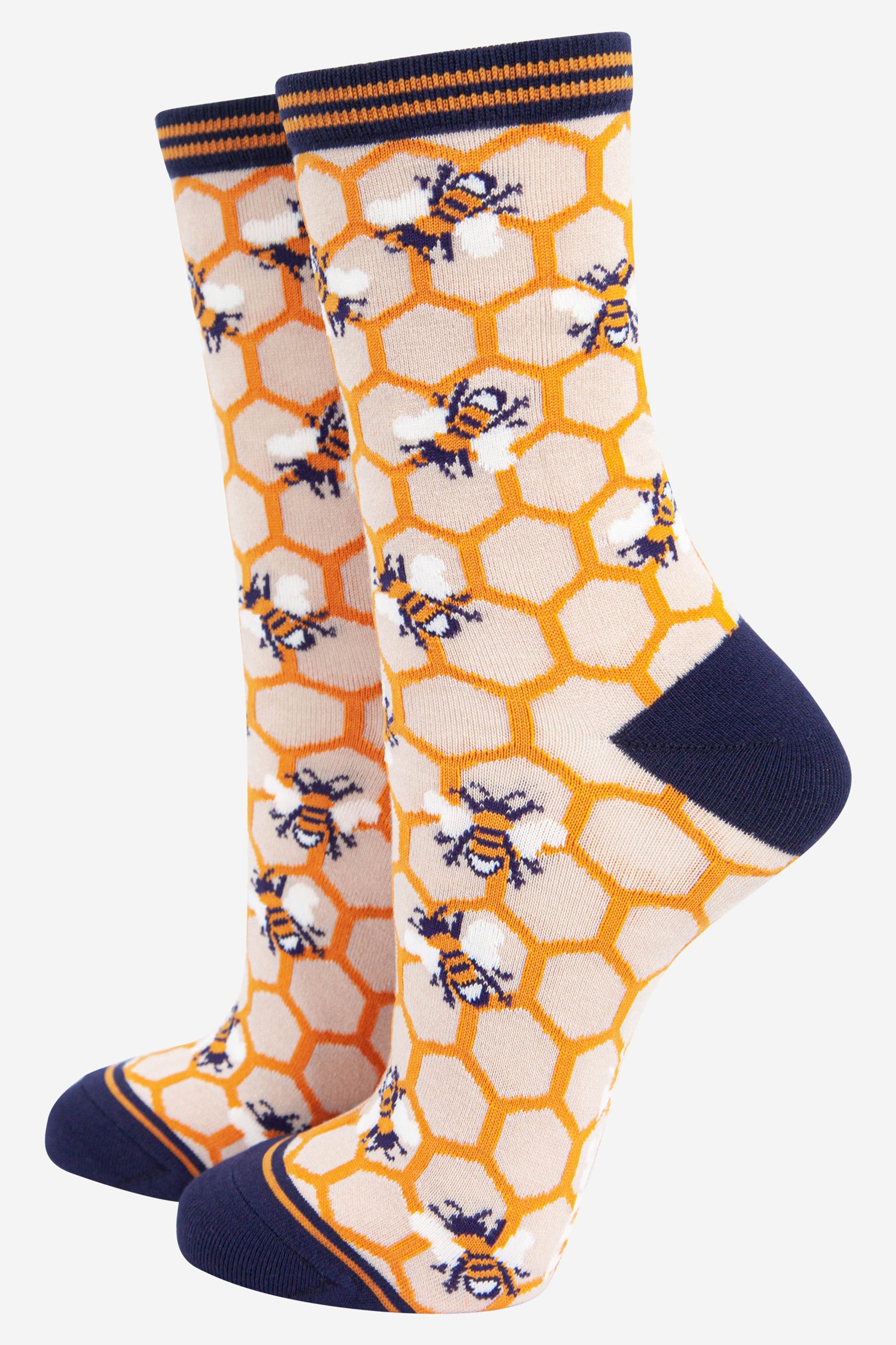 yellow and cream bamboo ankle socks with an all over yellow honeycomb pattern and scattered bees