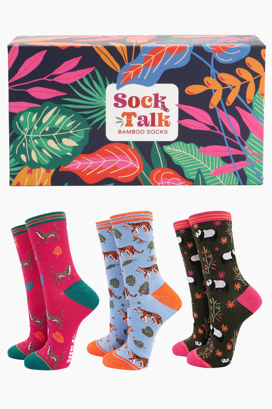mutlicoloured leaf pattern sock talk gift box with three pairs of ladies bamboo socks featuring pandas, tigers and cheetahs