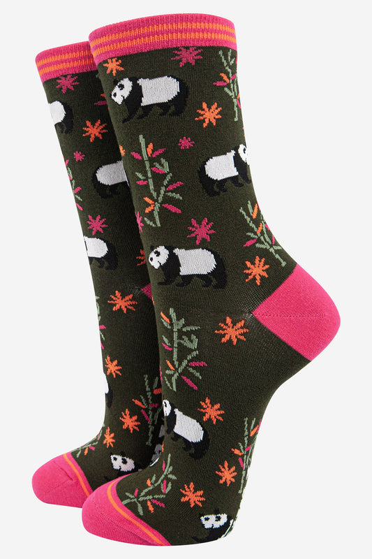 dark khaki green socks with pink heel, toe and cuff with an all over pattern featuring bamboo shoots and panda bears