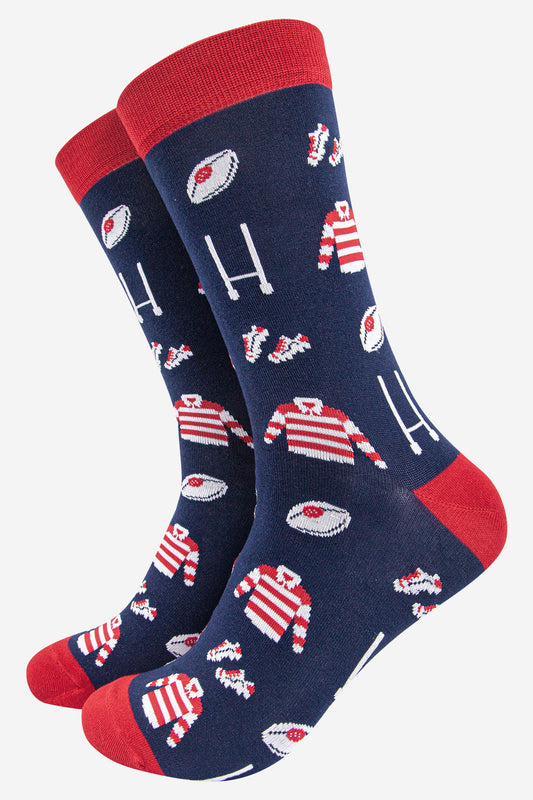 navy blue and red bamboo socks featuring a pattern of rugby shirts, goals, ball and boots