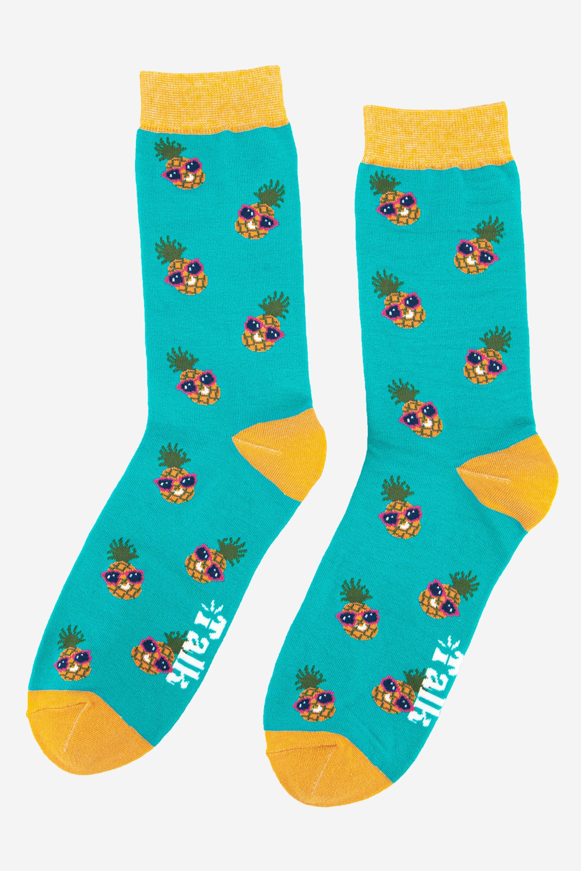 mens pineapple print bamboo socks in turquoise blue with a yellow toe, heel and cuff
