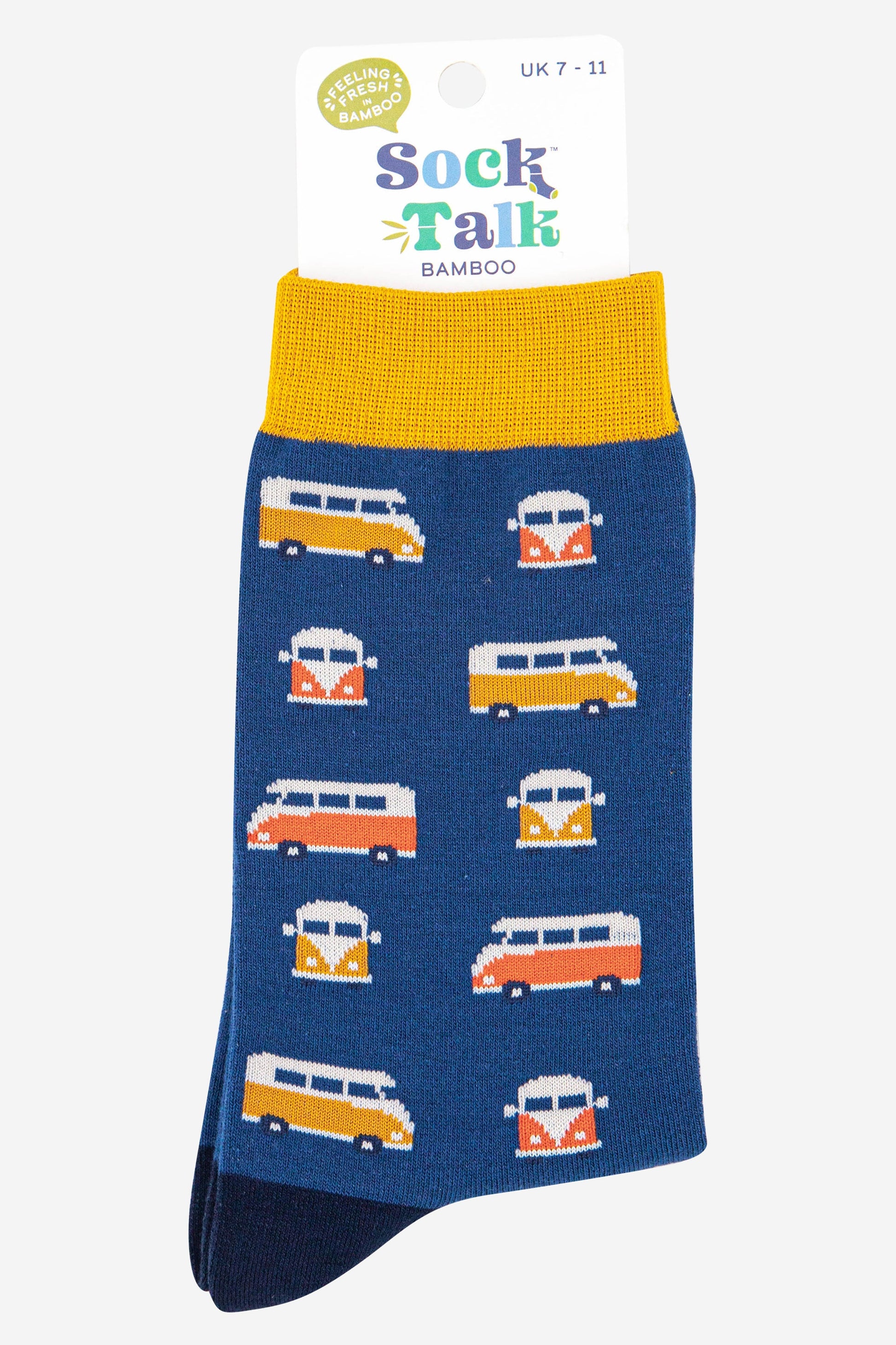 blue socks with a yellow cuff and an all over pattern featuring retro style campervans