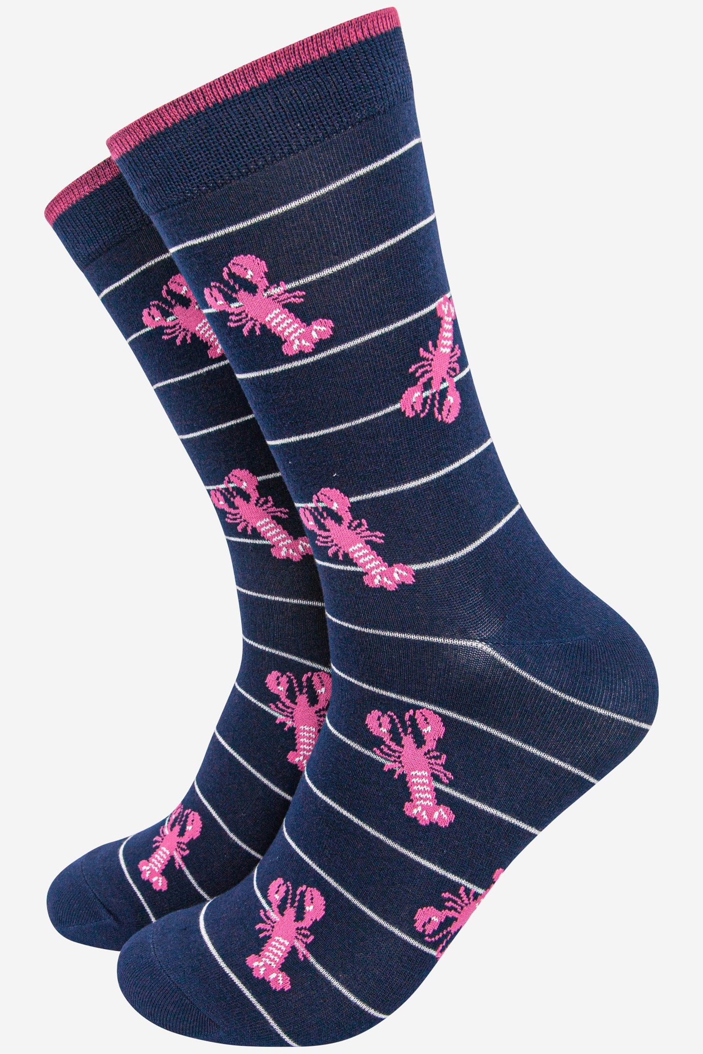 navy blue bamboo socks with a pattern of pink lobsters and a white horizonal pin stripe