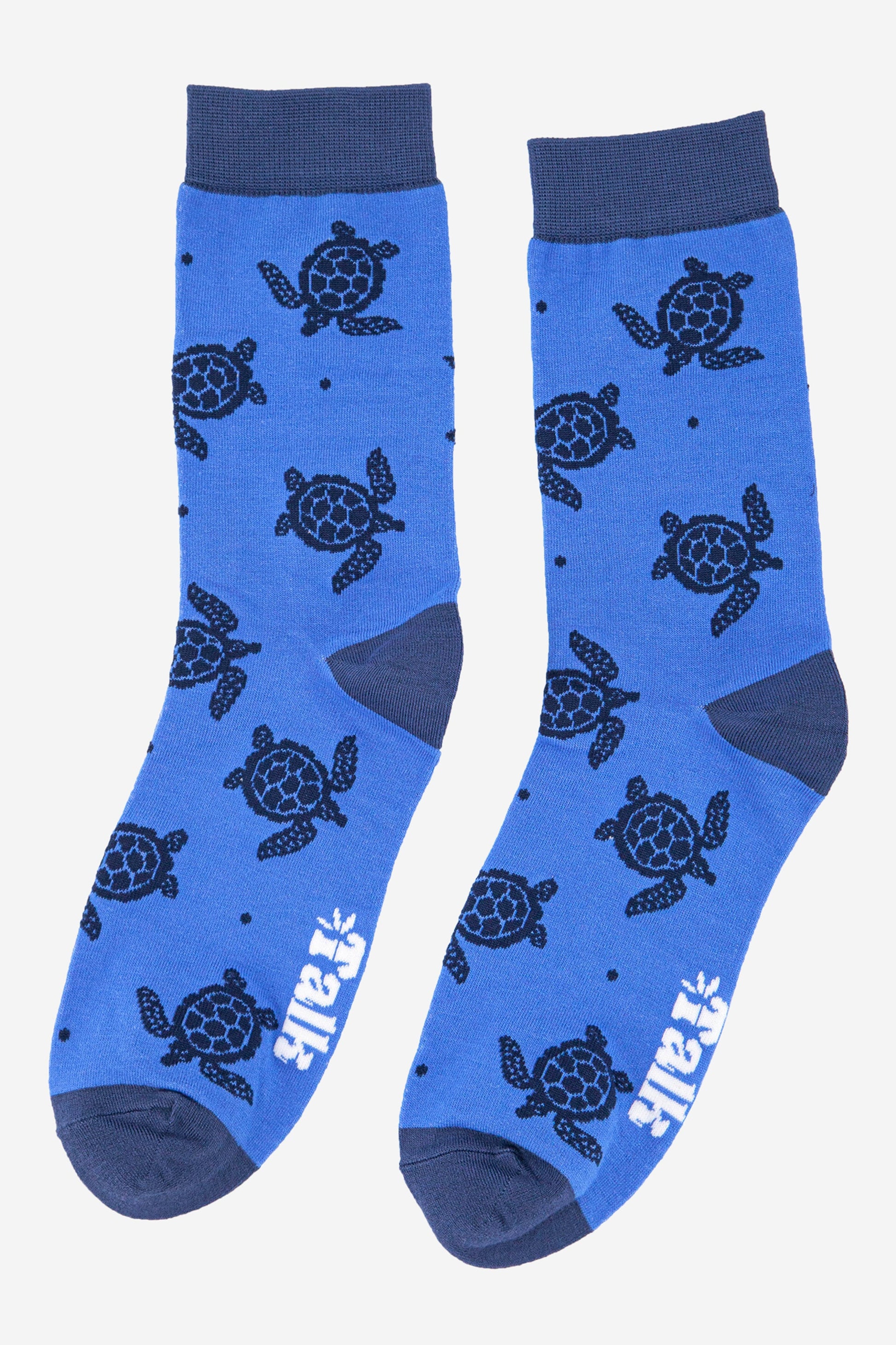 blue bamboo socks with swimming sea turtles all over, navy blue heel, toe and cuff