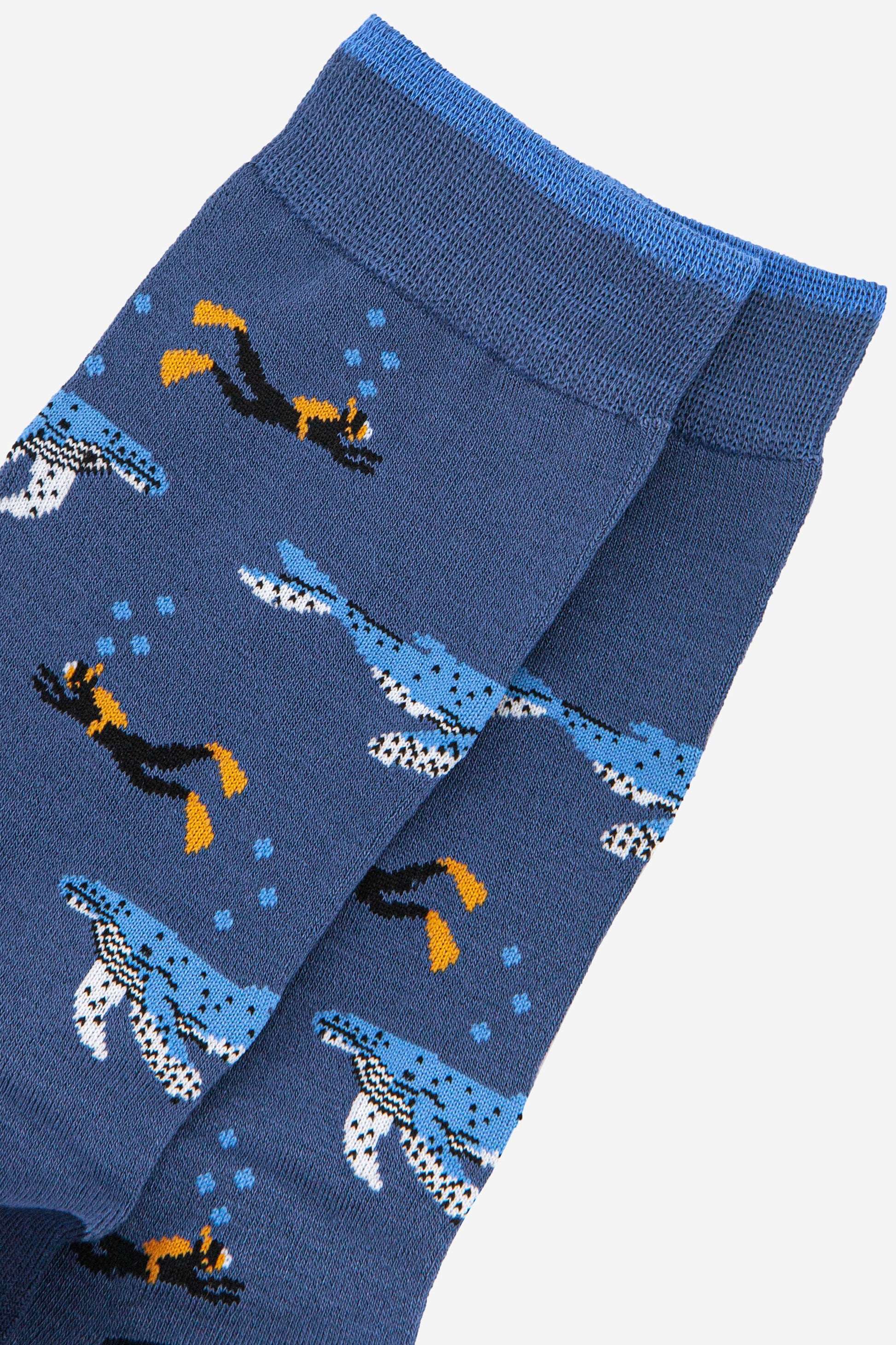 close up of the scuba diver and whale pattern on the bamboo socks