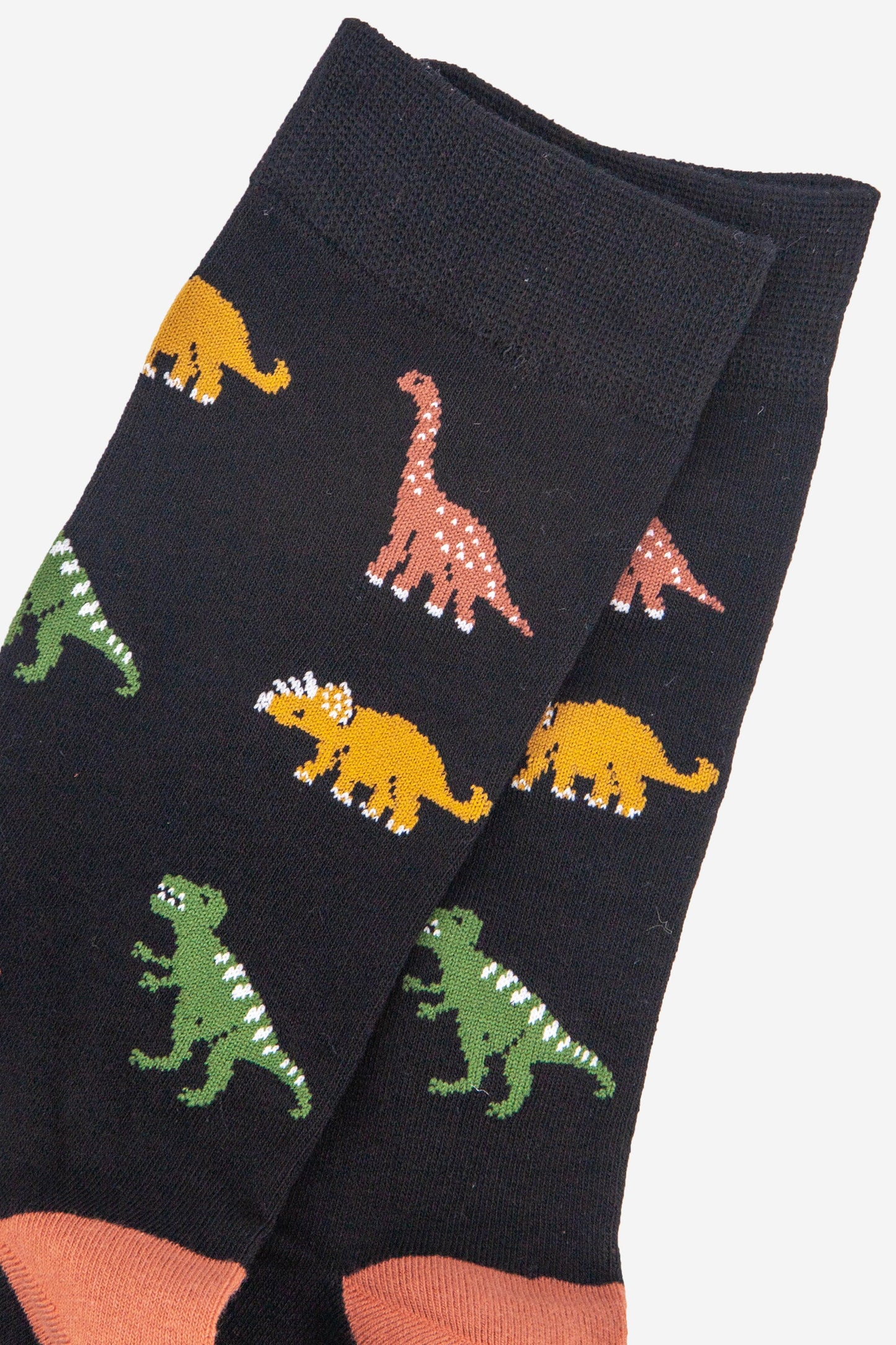 close up of the dino print pattern on the socks
