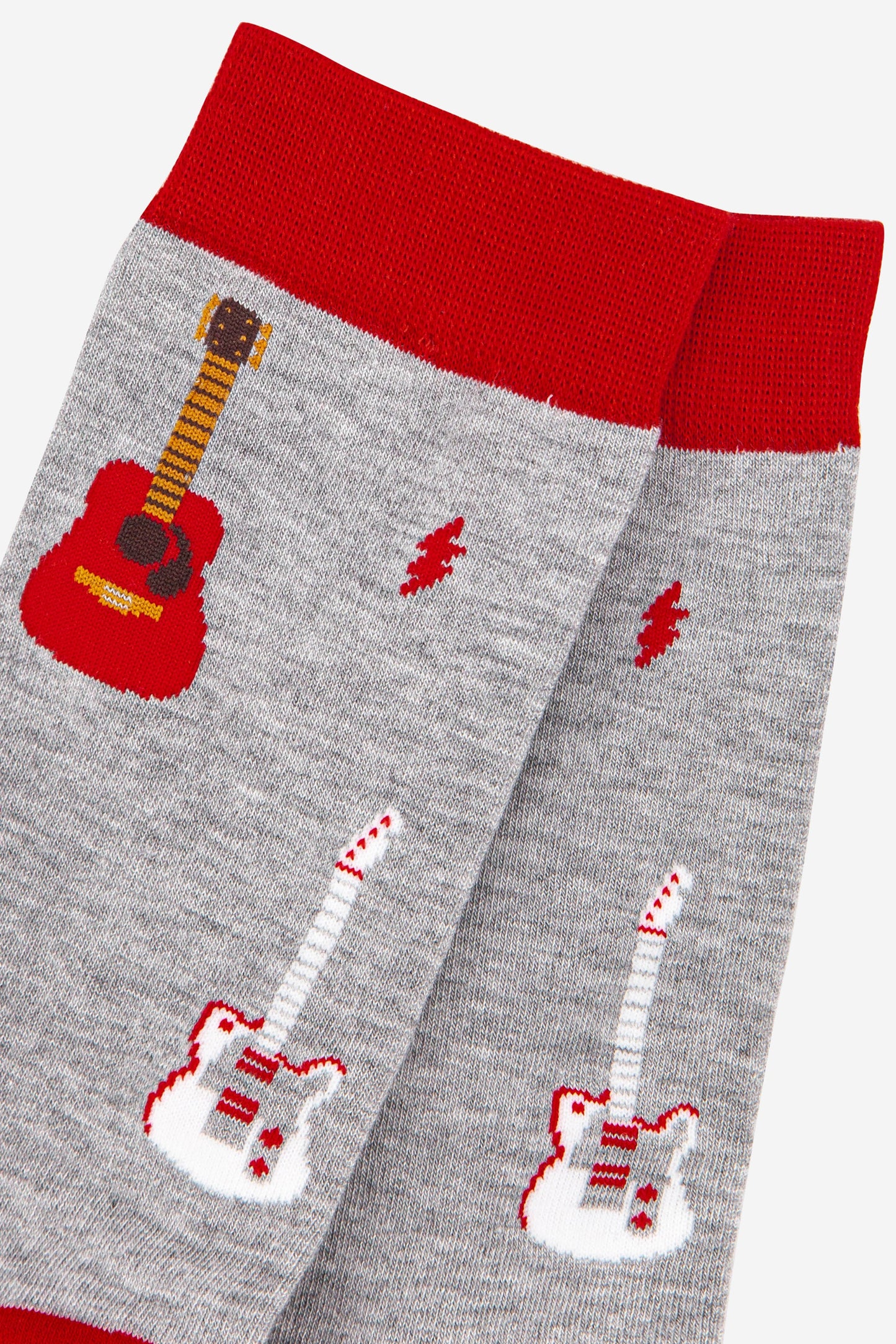close up of the guitar print pattern on the mens bamboo socks