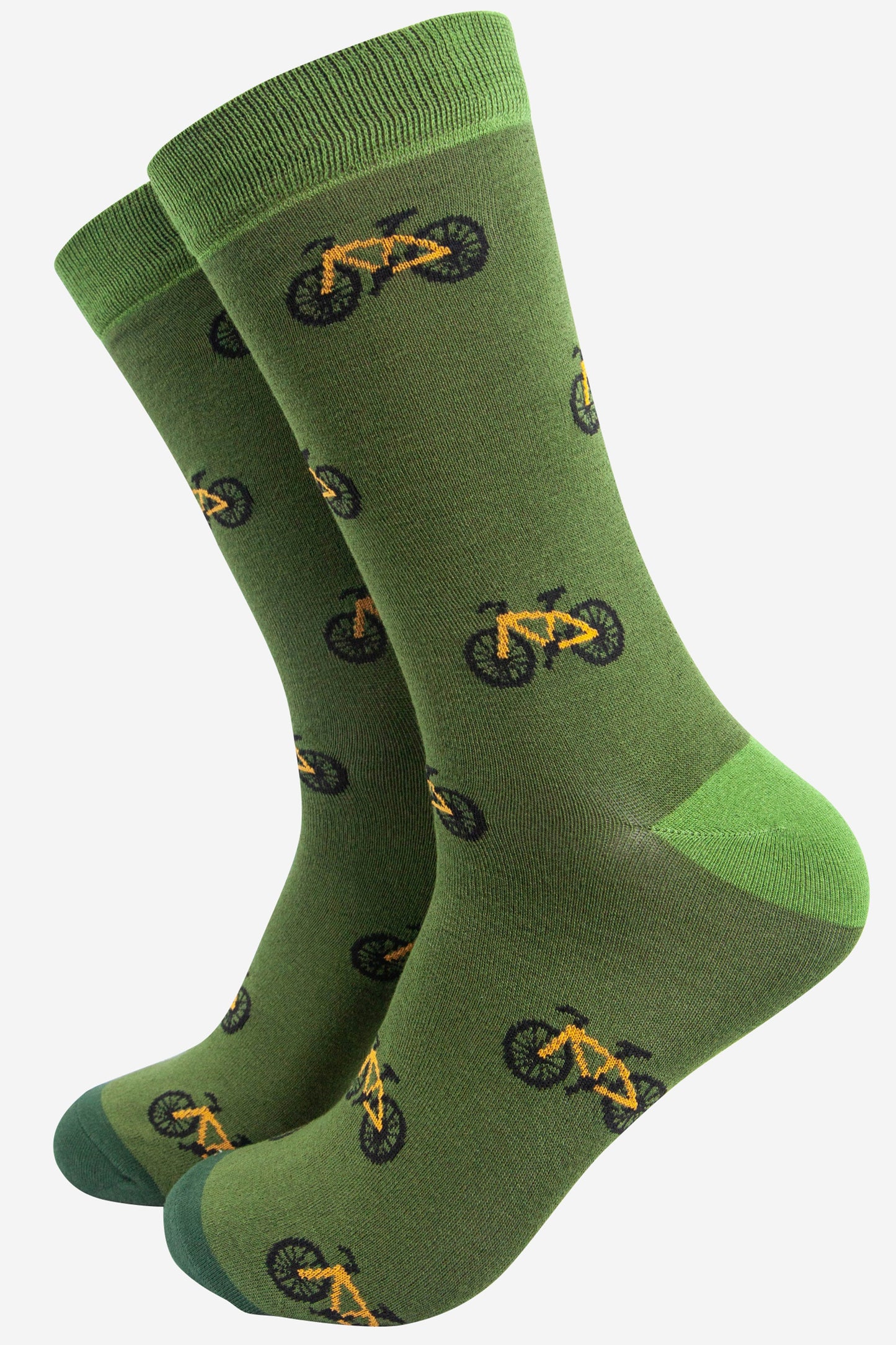 green bamboo socks with an all over pattern of yellow mountain bikes