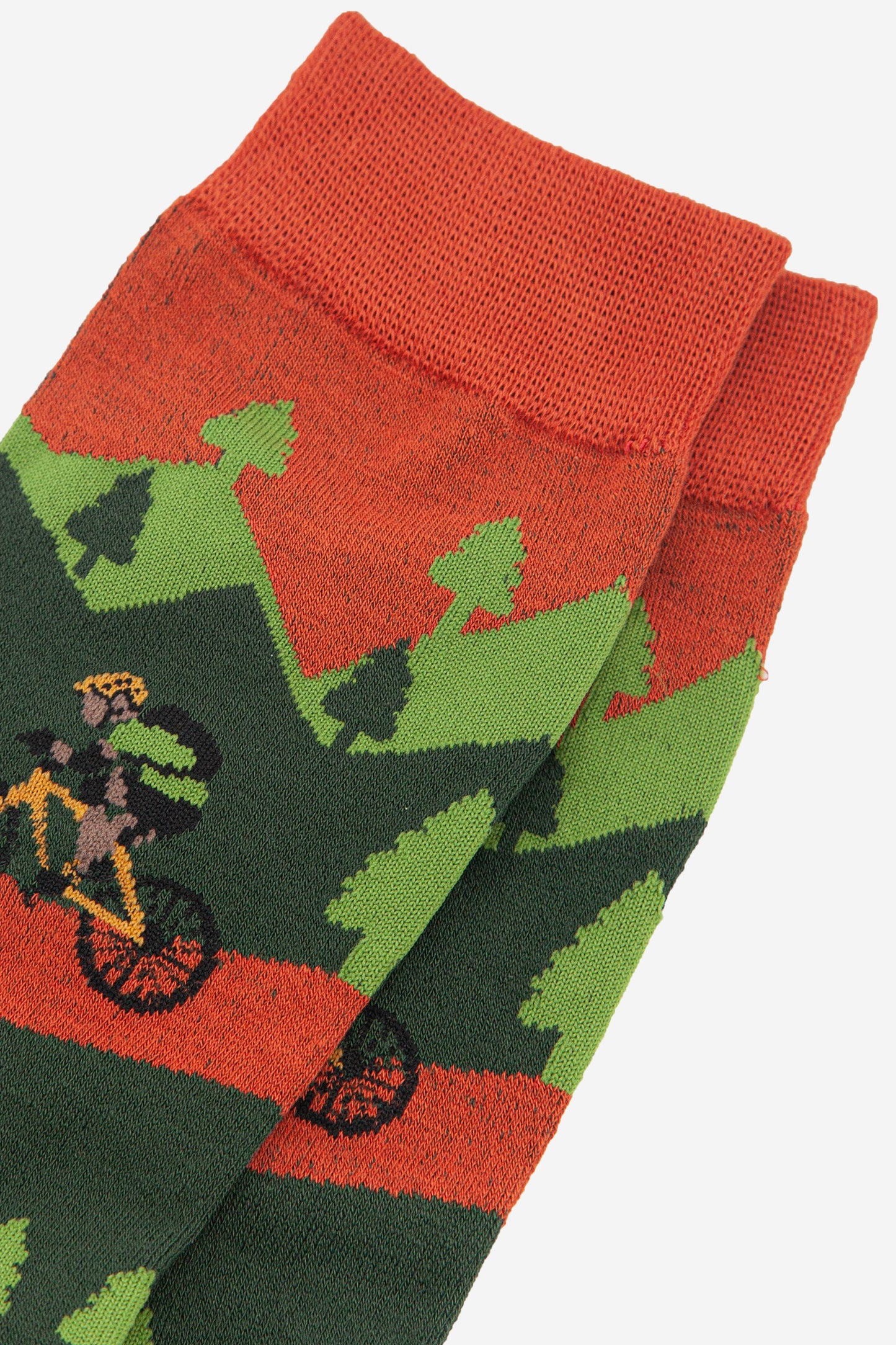 close up of the mountain bike and tree pattern on the bamboo socks