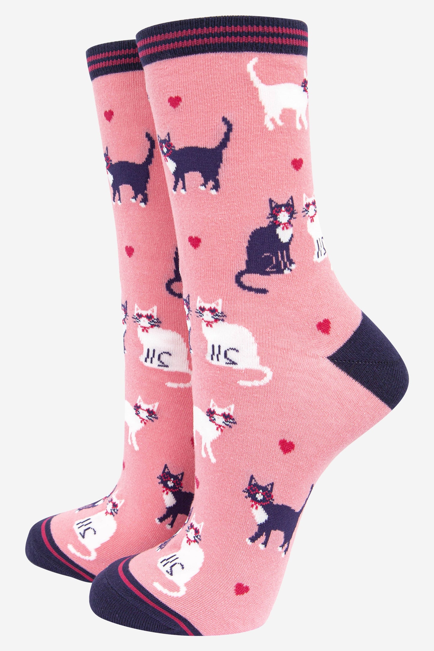 pink bamboo socks with a pattern of white and blue cats and red love hearts all over