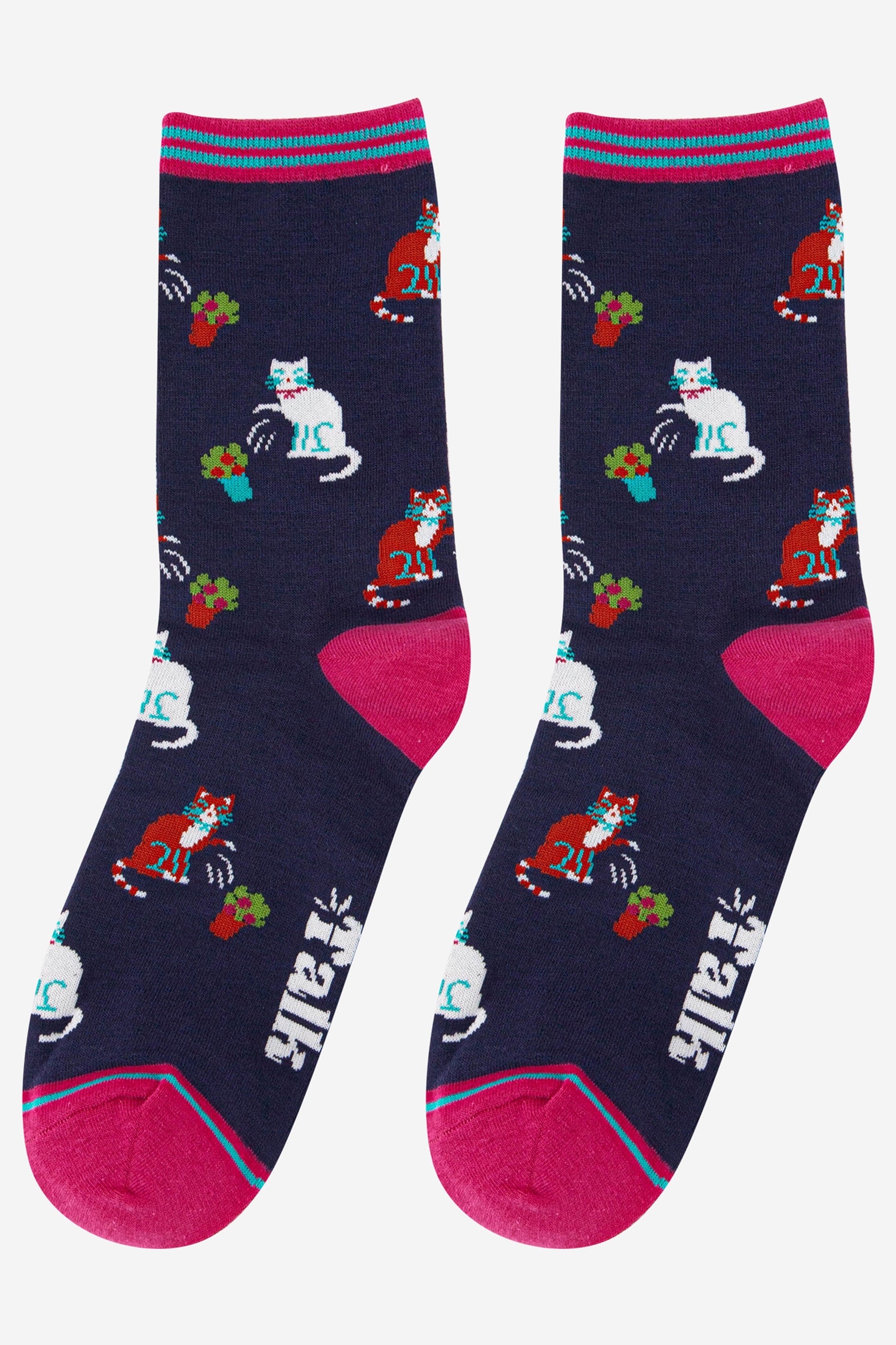 navy blue socks with pink heel, toe and trim featuring a funny cat print