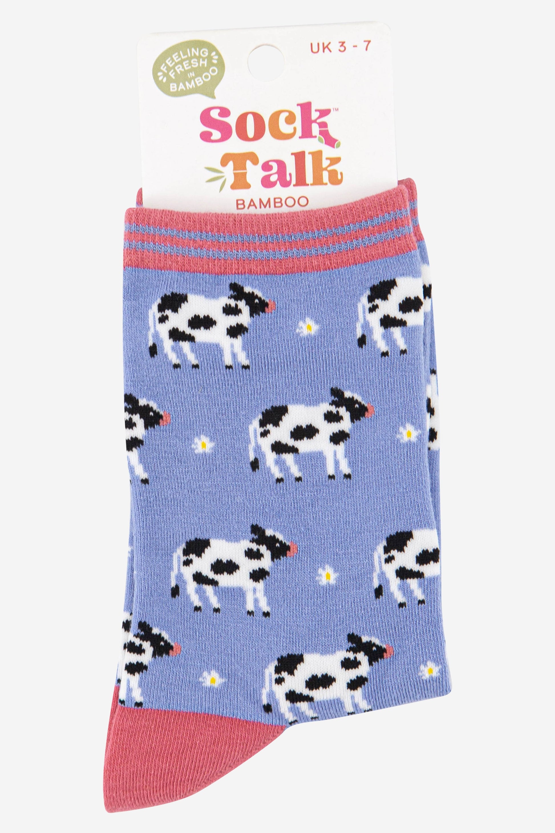womens lilac bamboo socks with a pattern of farm cows on them