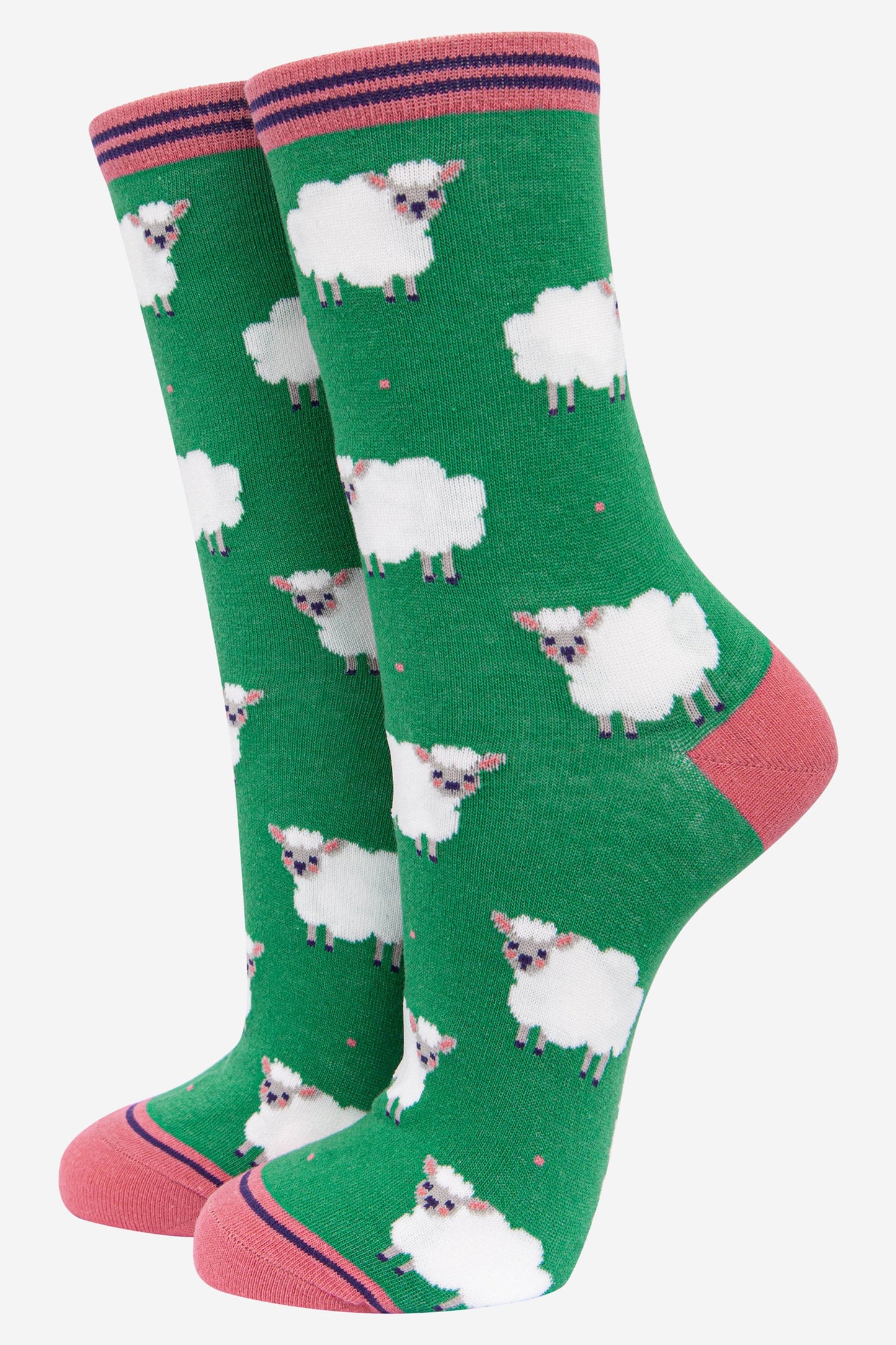 green ankle socks featuring a pattern of white woolly sheep all over
