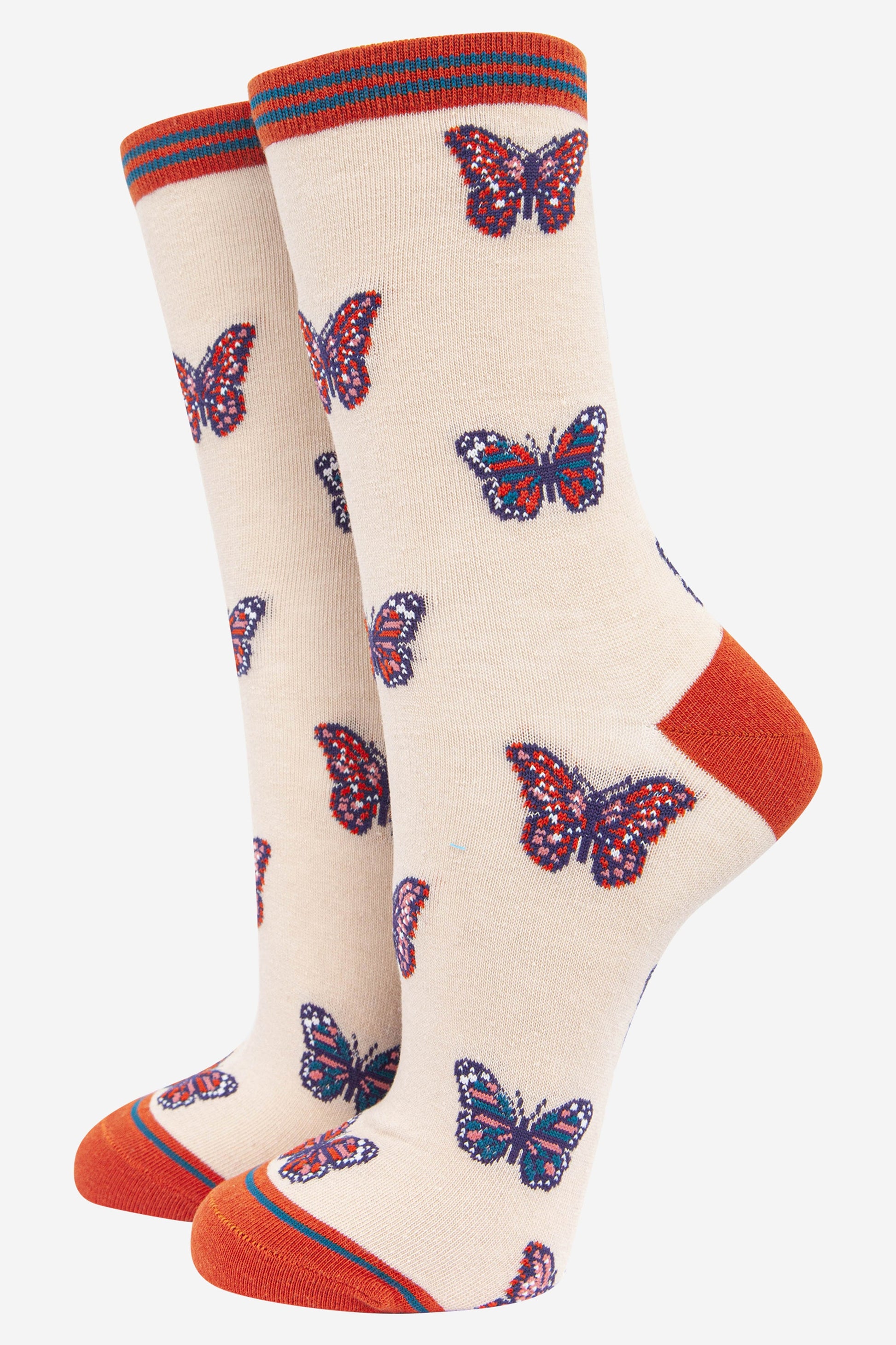 cream bamboo socks with a pattern of multicoloured butterflies