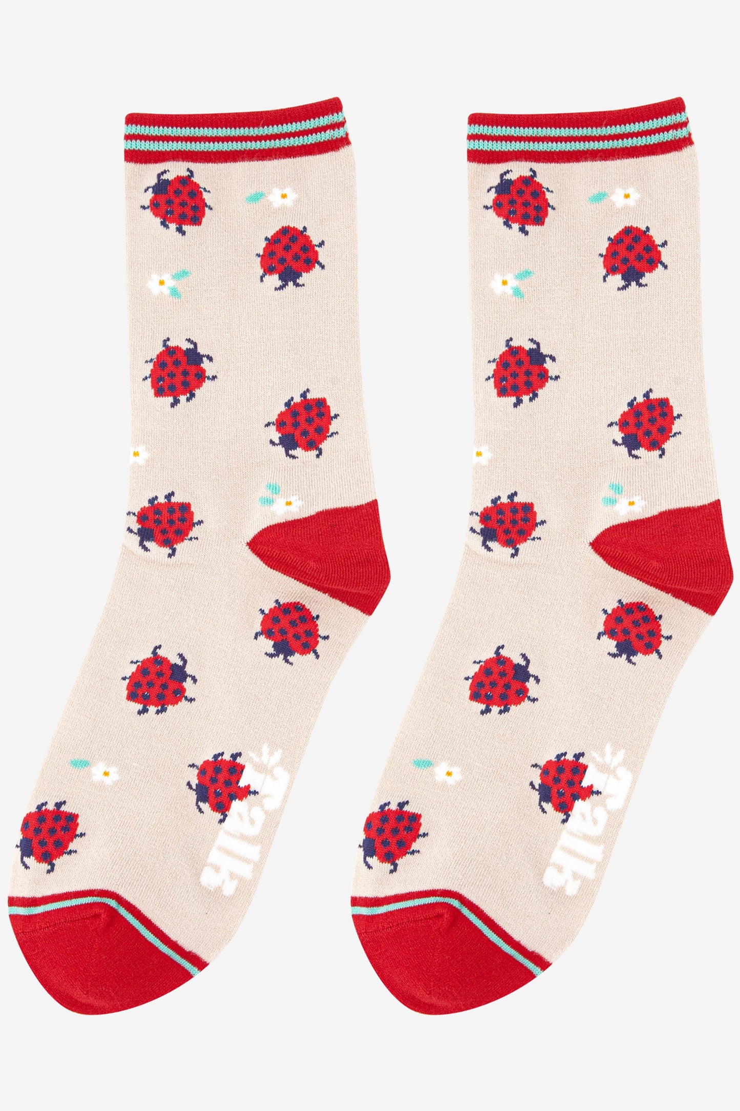 cream and red bamboo socks featuring ladybirds and flowers