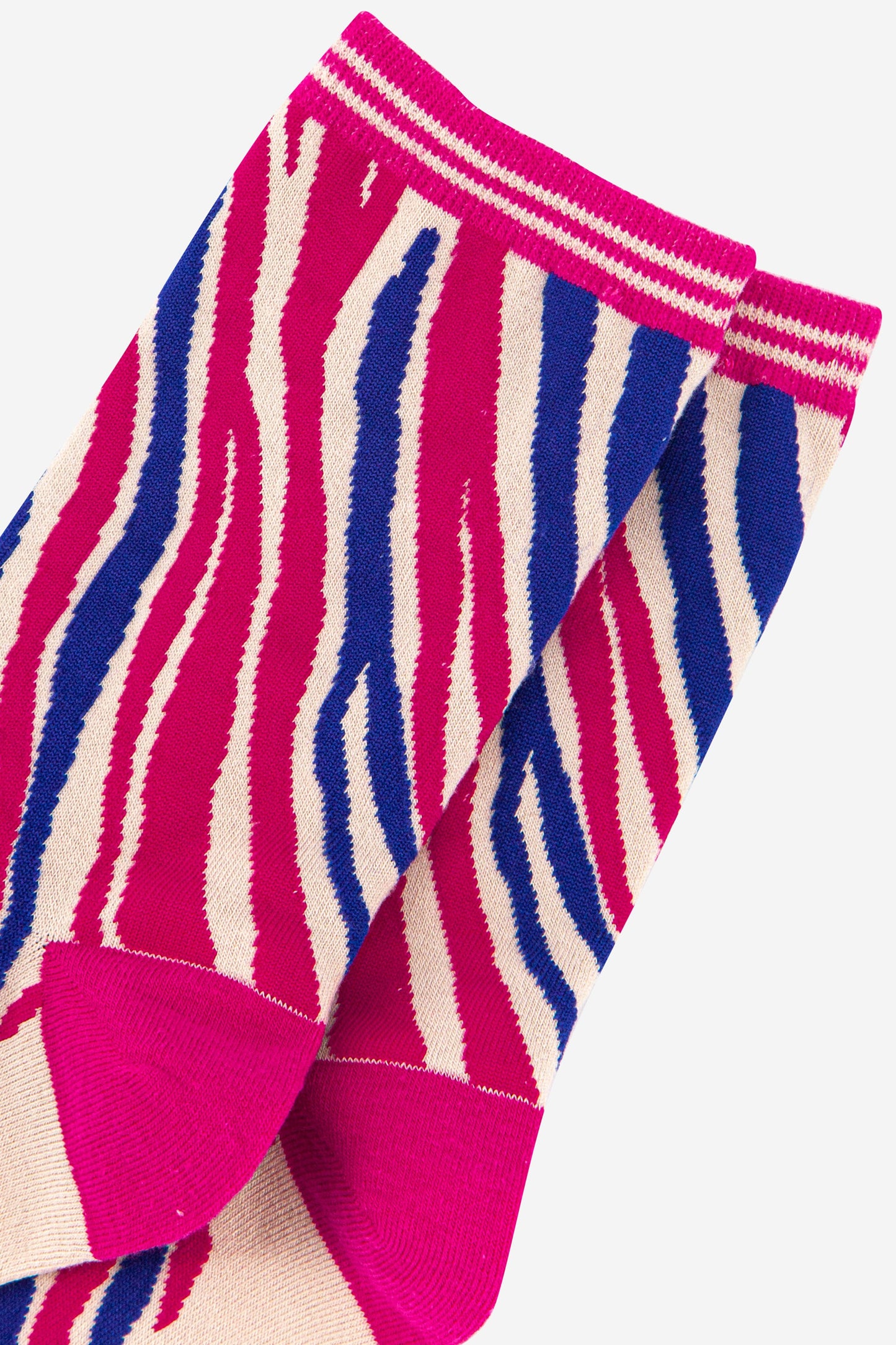 close up of the hot pink and blue zebra print pattern
