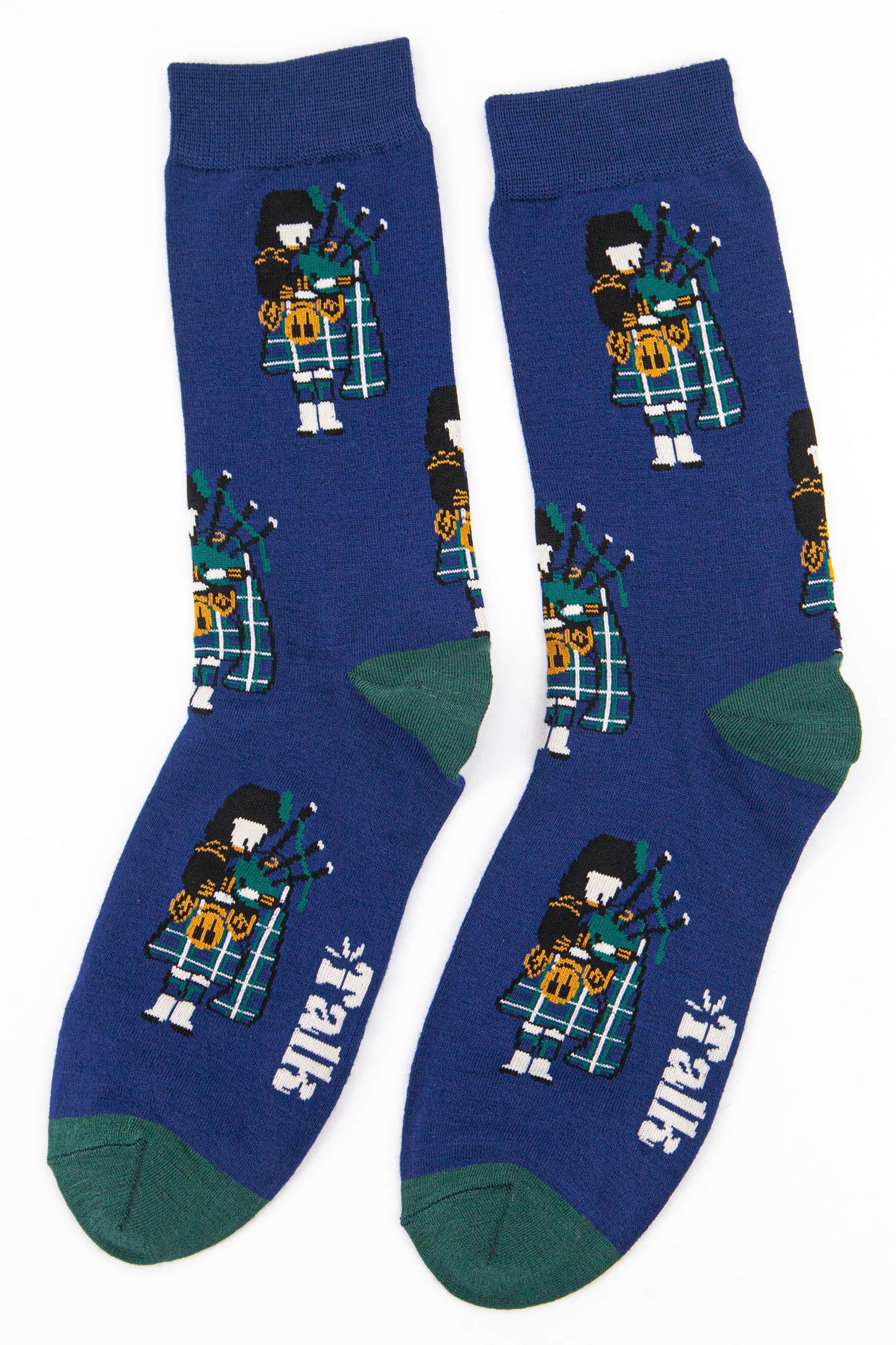 blue dress socks with green toe, and heel featuring a highland piper playing the Scottish bagpipes