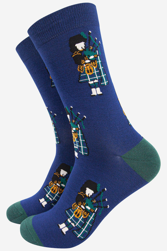 mens blue bamboo socks featuring a traditional Scottish bagpipe player wearing a kilt