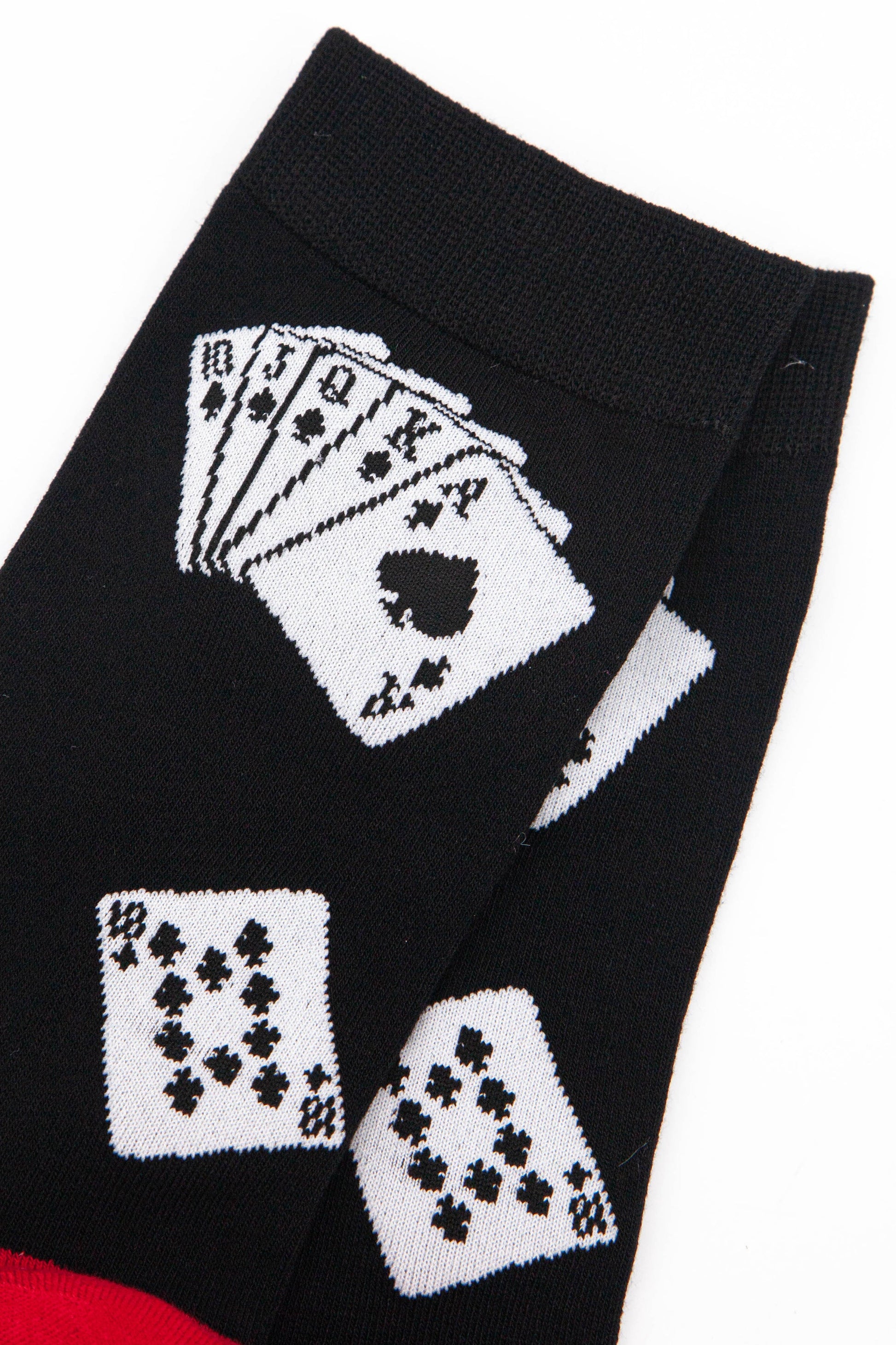 close up of a royal flush hand of cards on the ankle of the bamboo socks